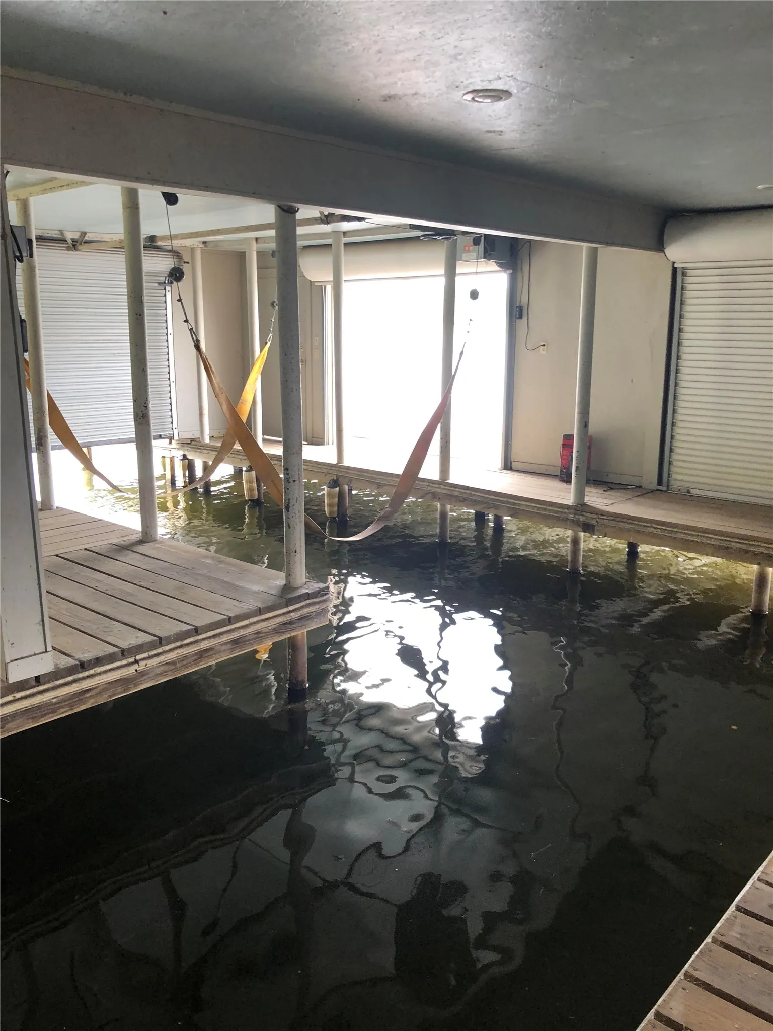 Boat house with lift and plenty of room to park your boat and lake toys!