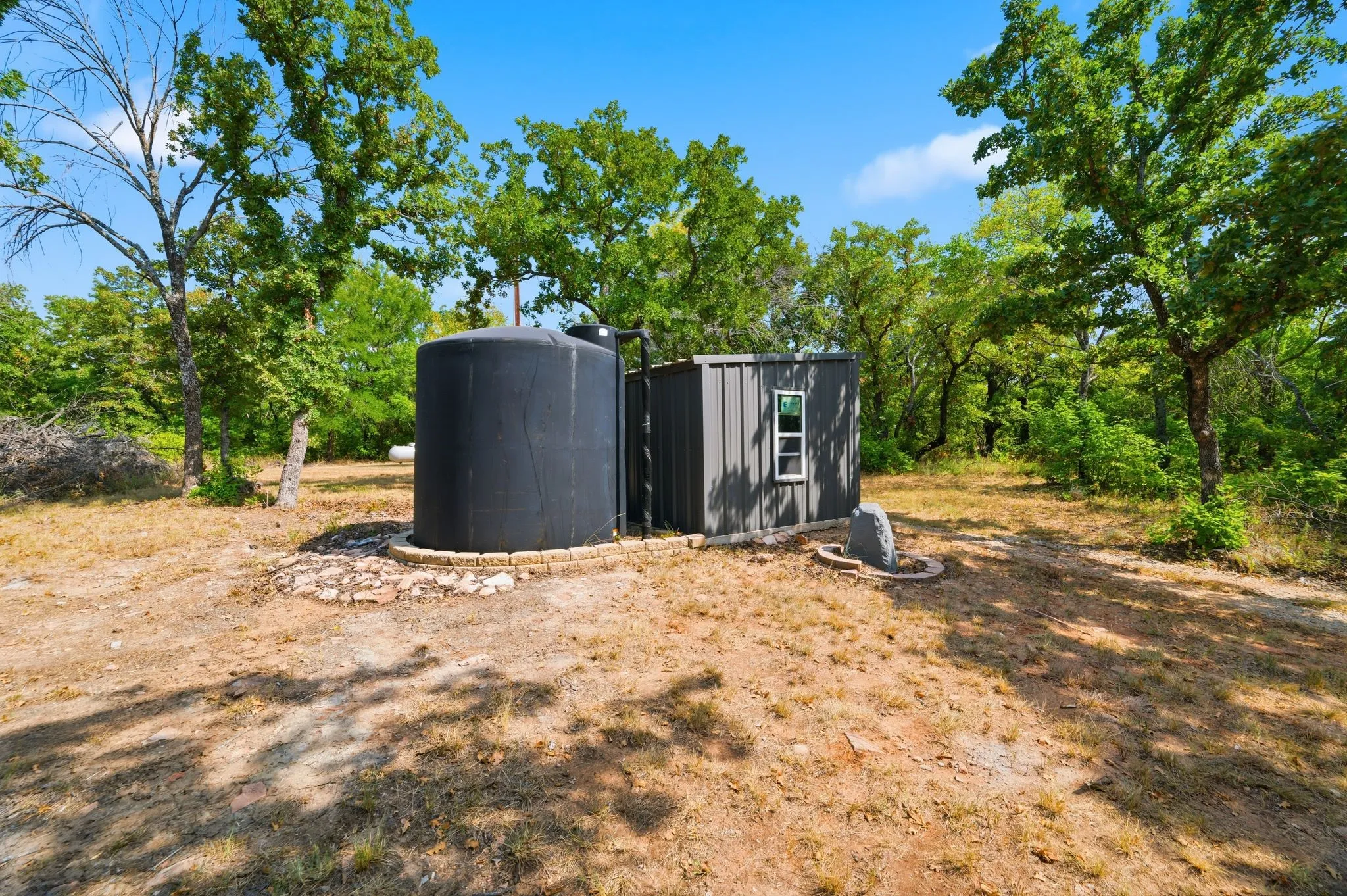 Well house and 3k gallon holding  tank