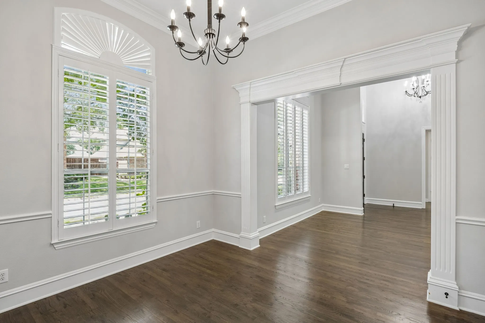 Light-Filled Dining Area Offering Beautiful Views of the Tree-Lined Street