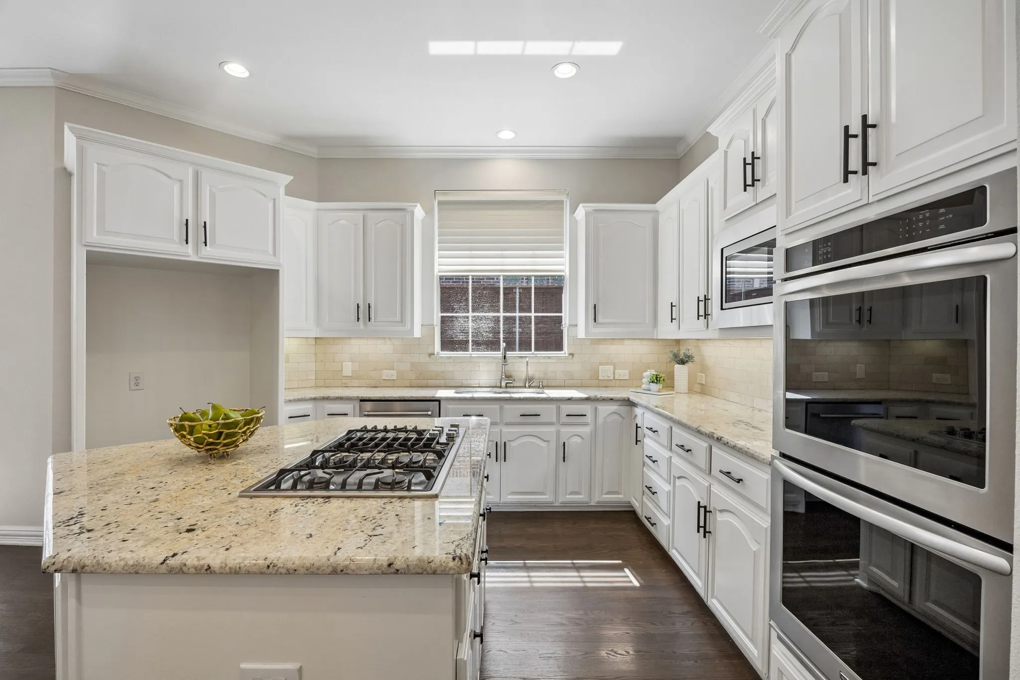 Well-Equipped Kitchen with Double Ovens and Gas Cooktop