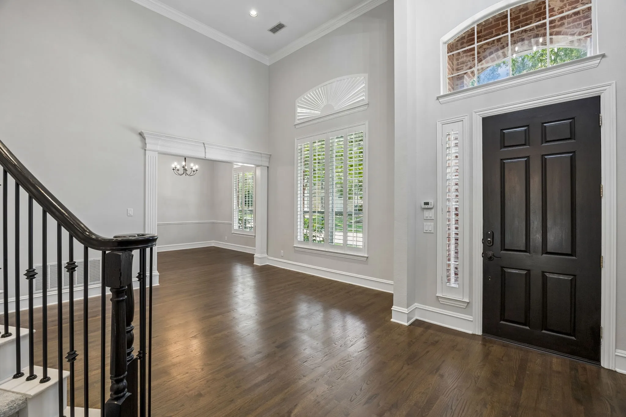 Light-Filled Entry, Living, and Dining Spaces with Expansive Windows