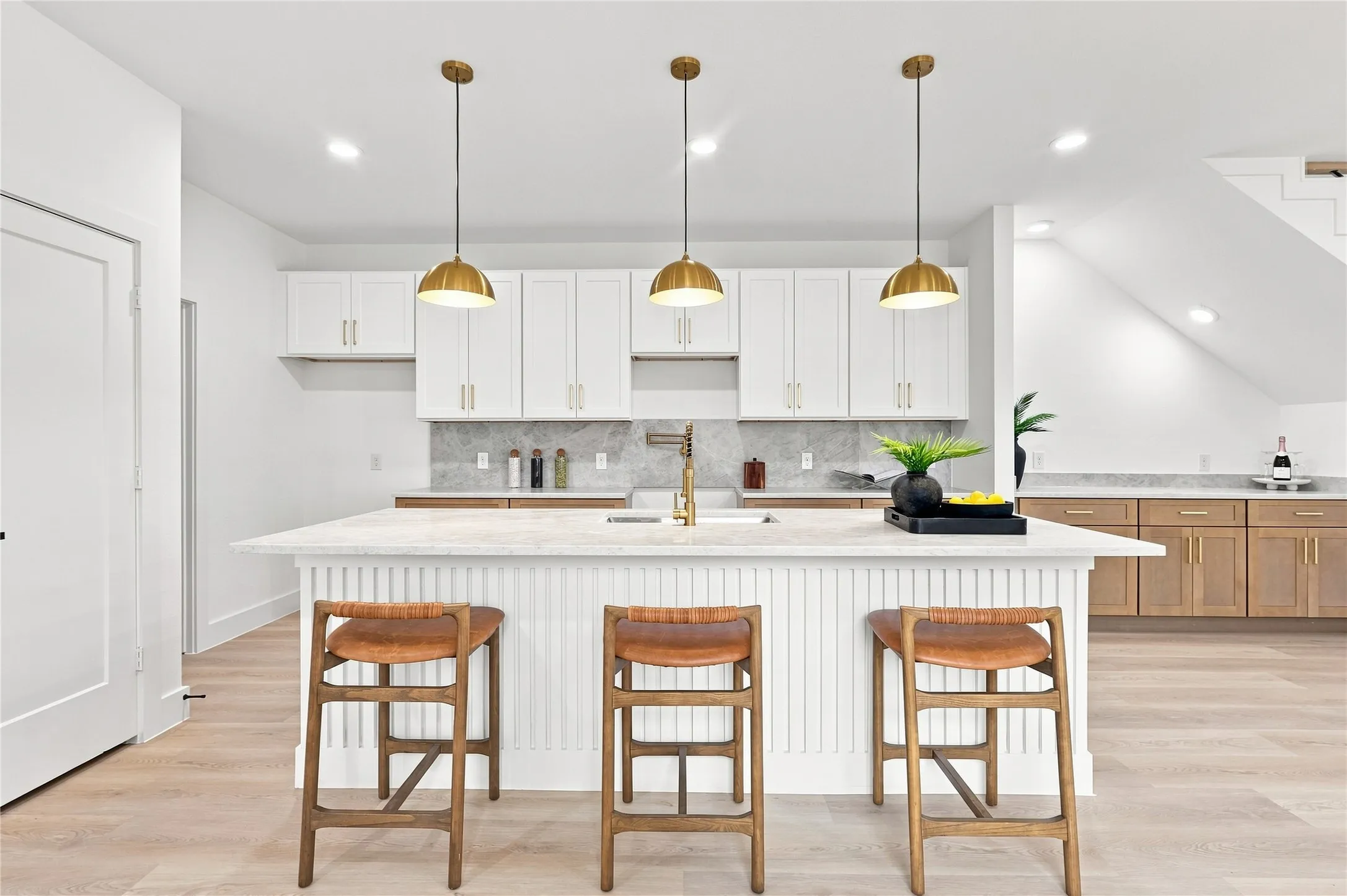 Unit B - Contemporary Kitchen Island with fluted paneling, and Waterfall Countertop