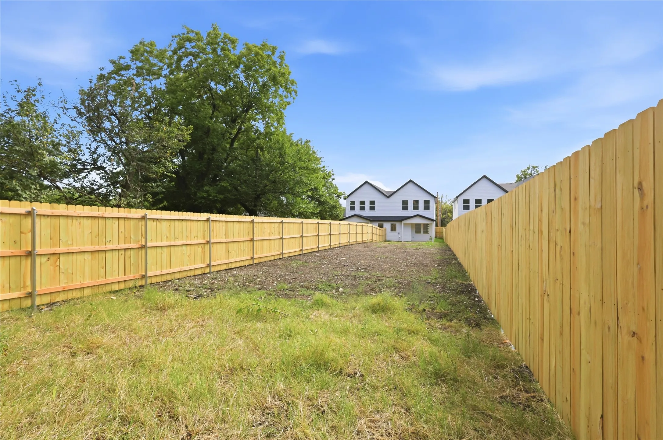 Spacious Private Fenced Backyard with Gated Entry.