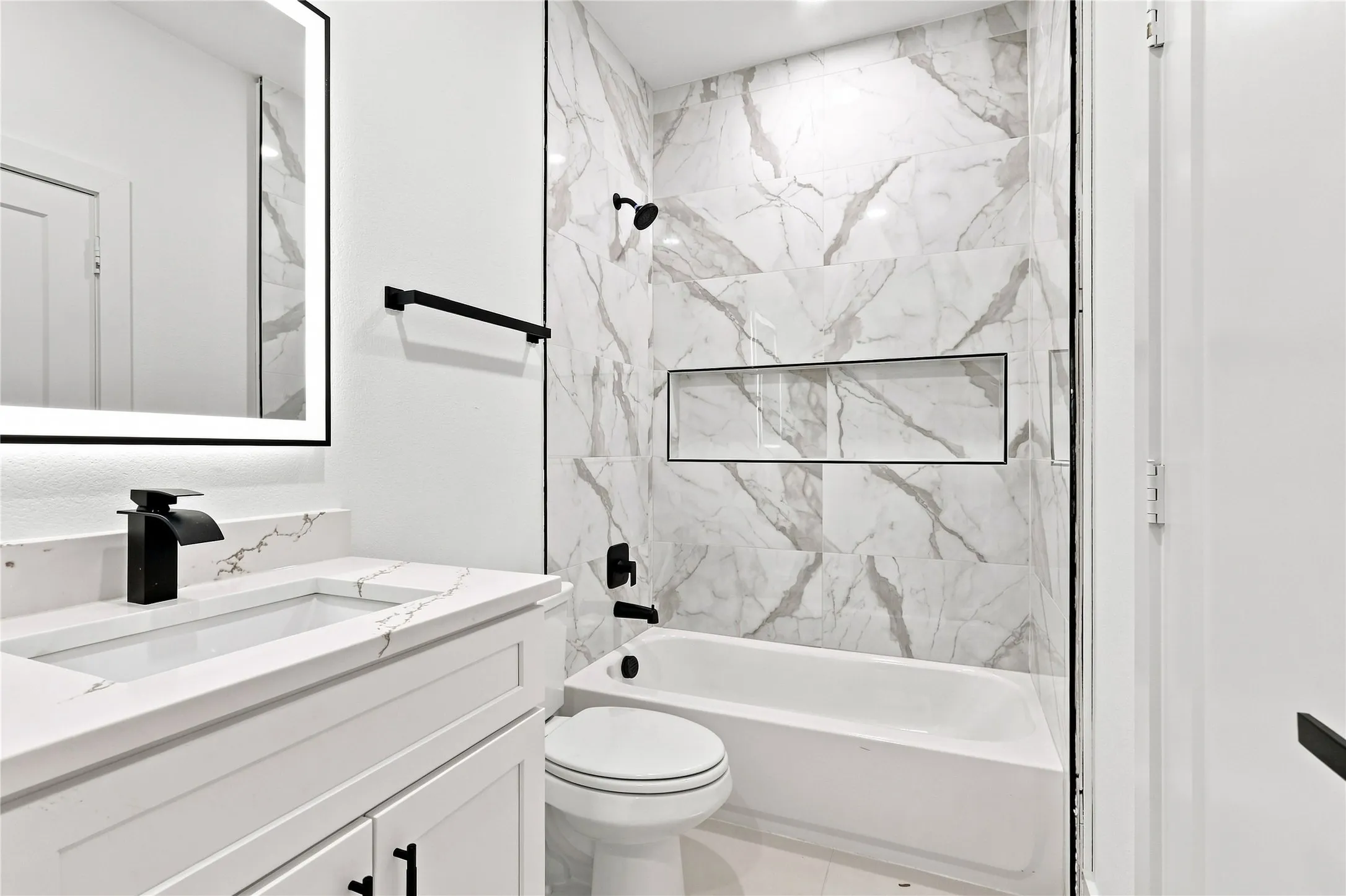Example of Secondary and Third Private Ensuite Bathroom Showing Example of  Layout and Finishes Units A and B