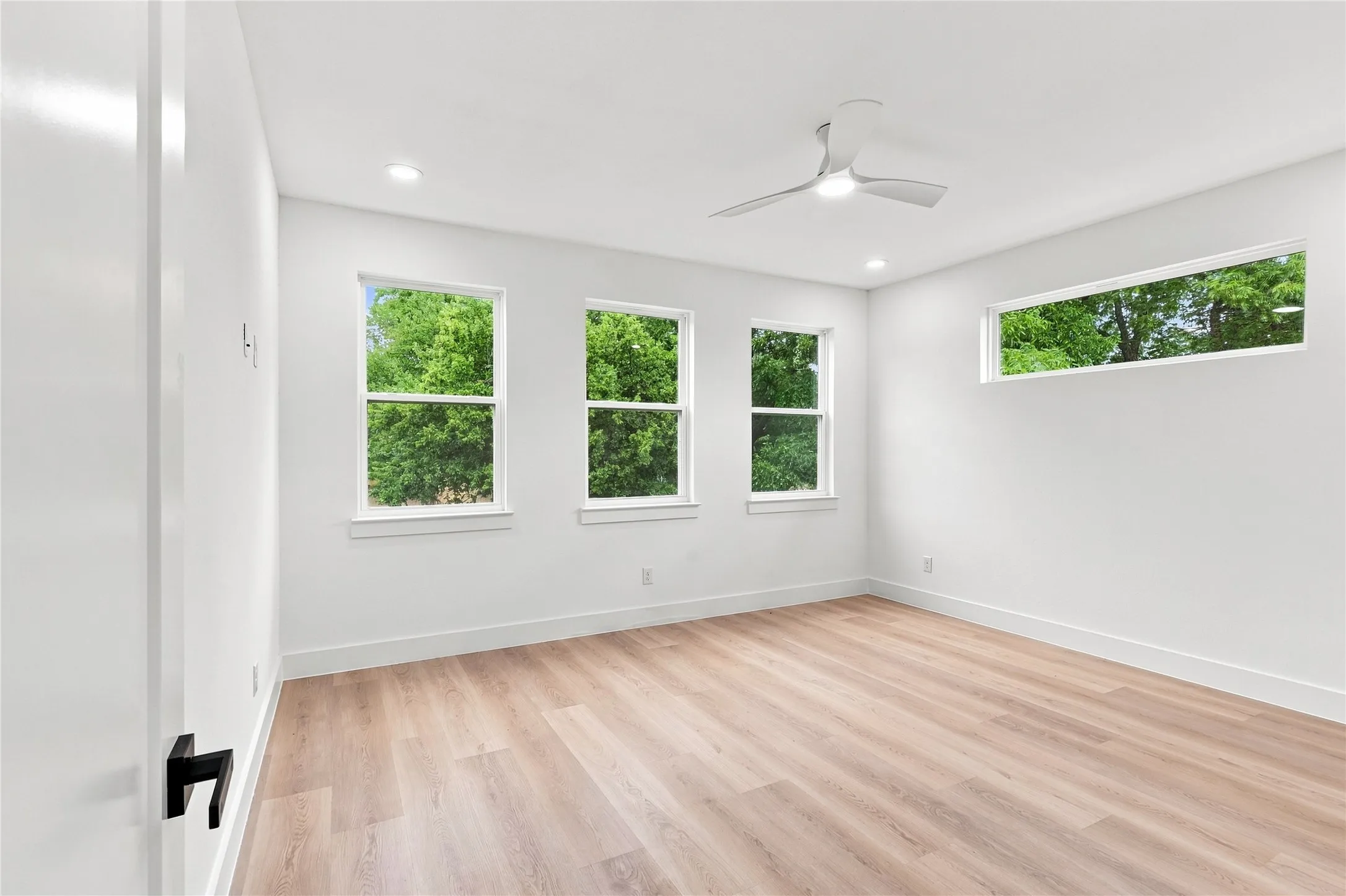 Unit B - Spacious Primary Bedroom with Private Ensuite, Multiple Windows and Abundant Natural Light