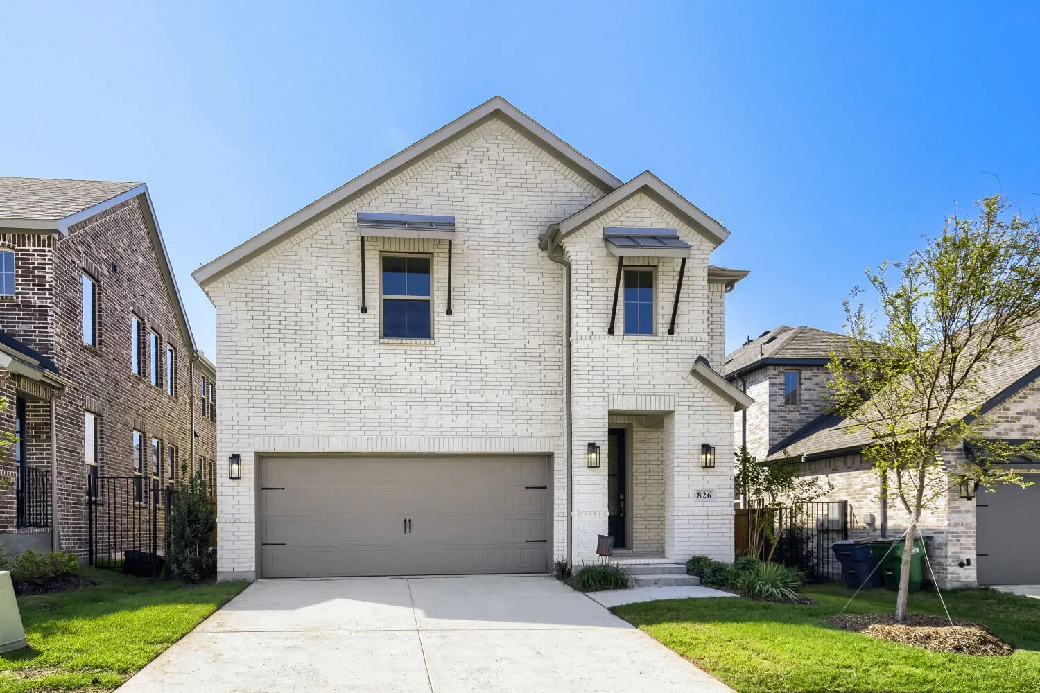 White brick exterior with gray trim details