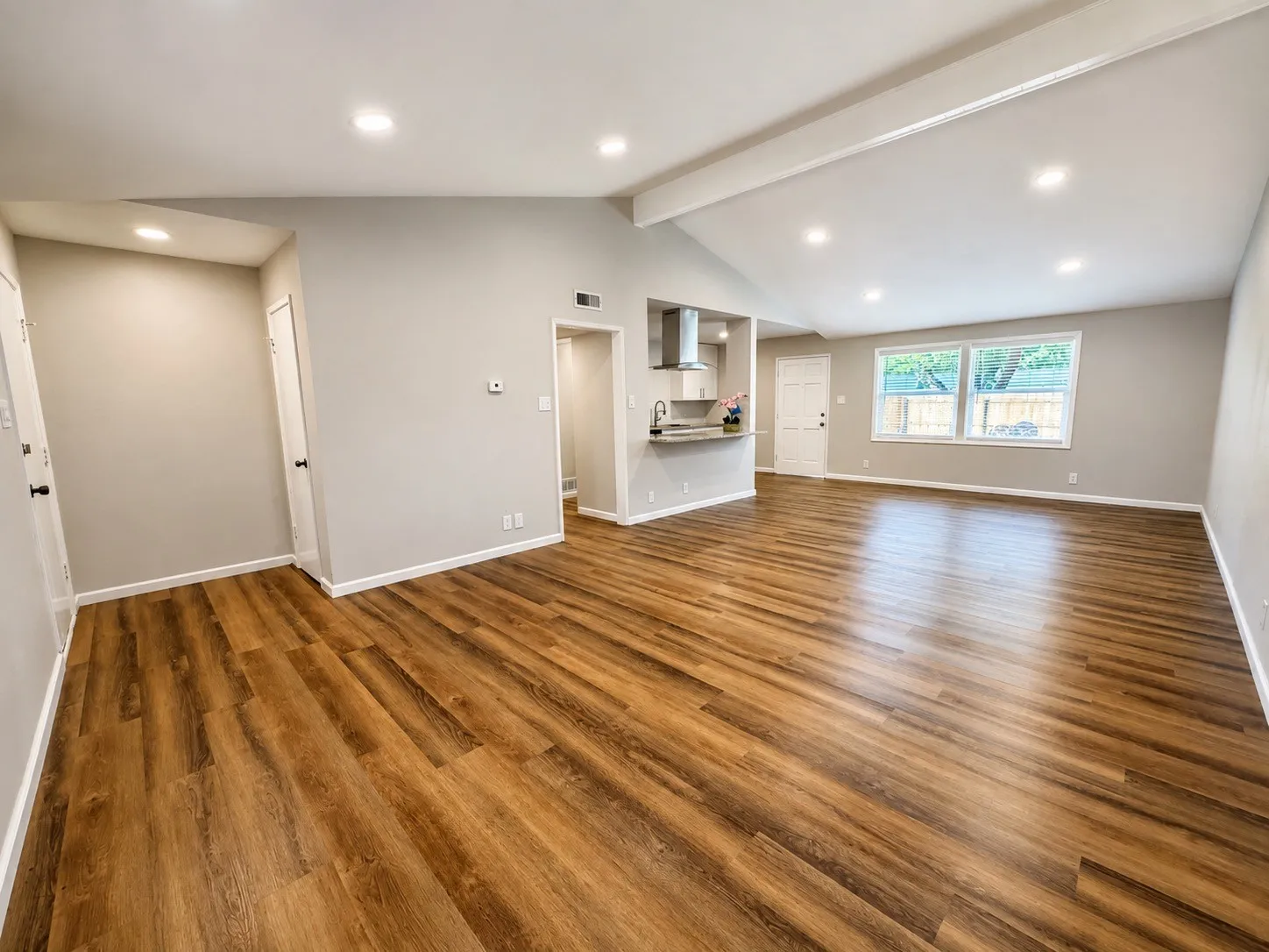 Large dining and living area showing entry point