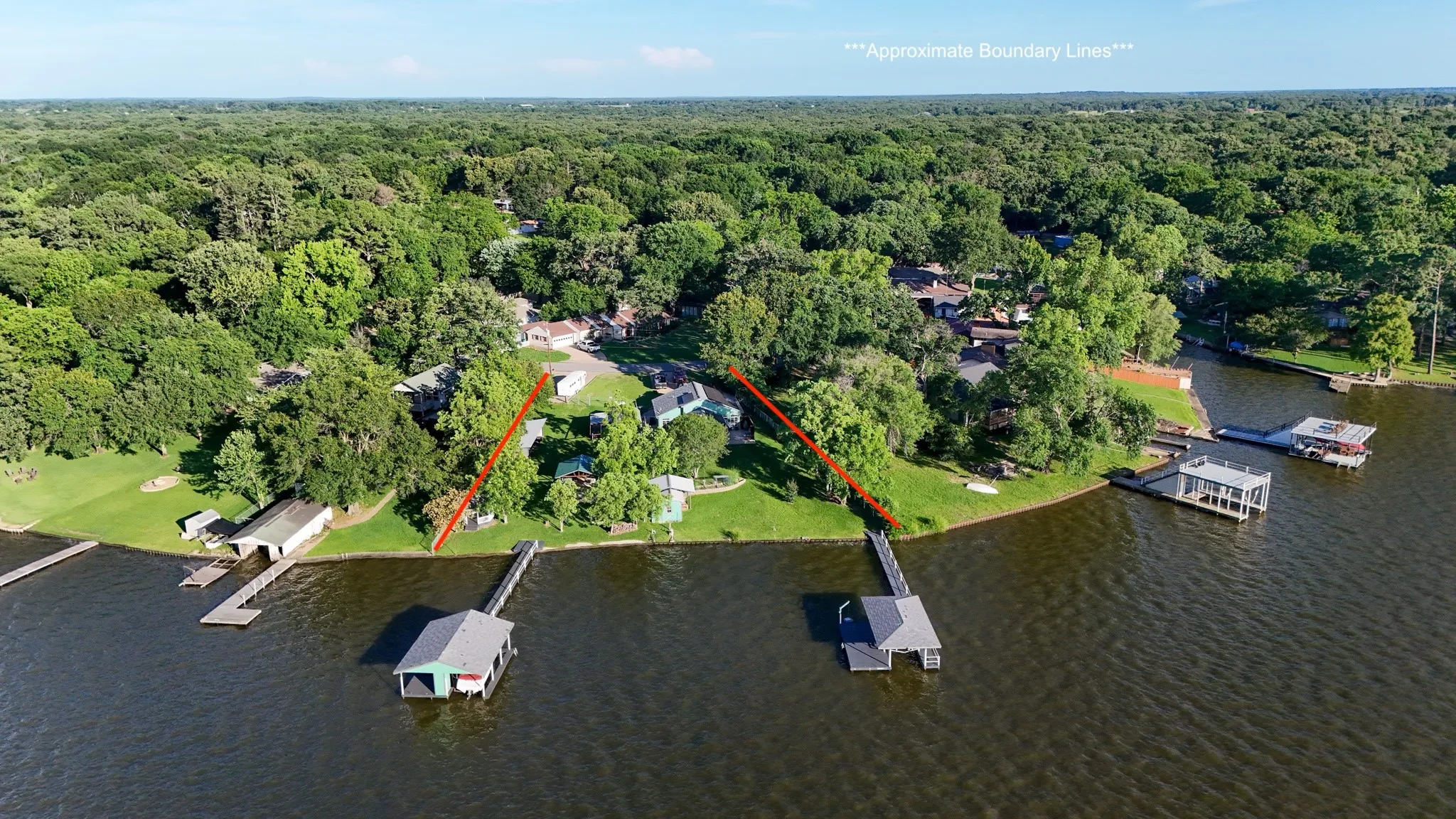 Aerial view showing 2 boathouses and large lot