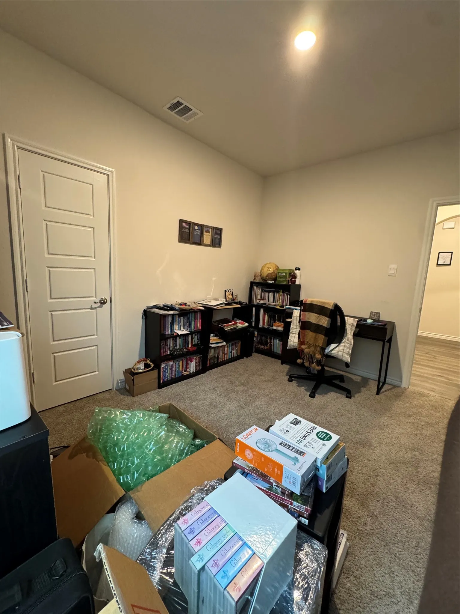 Living room featuring carpet floors