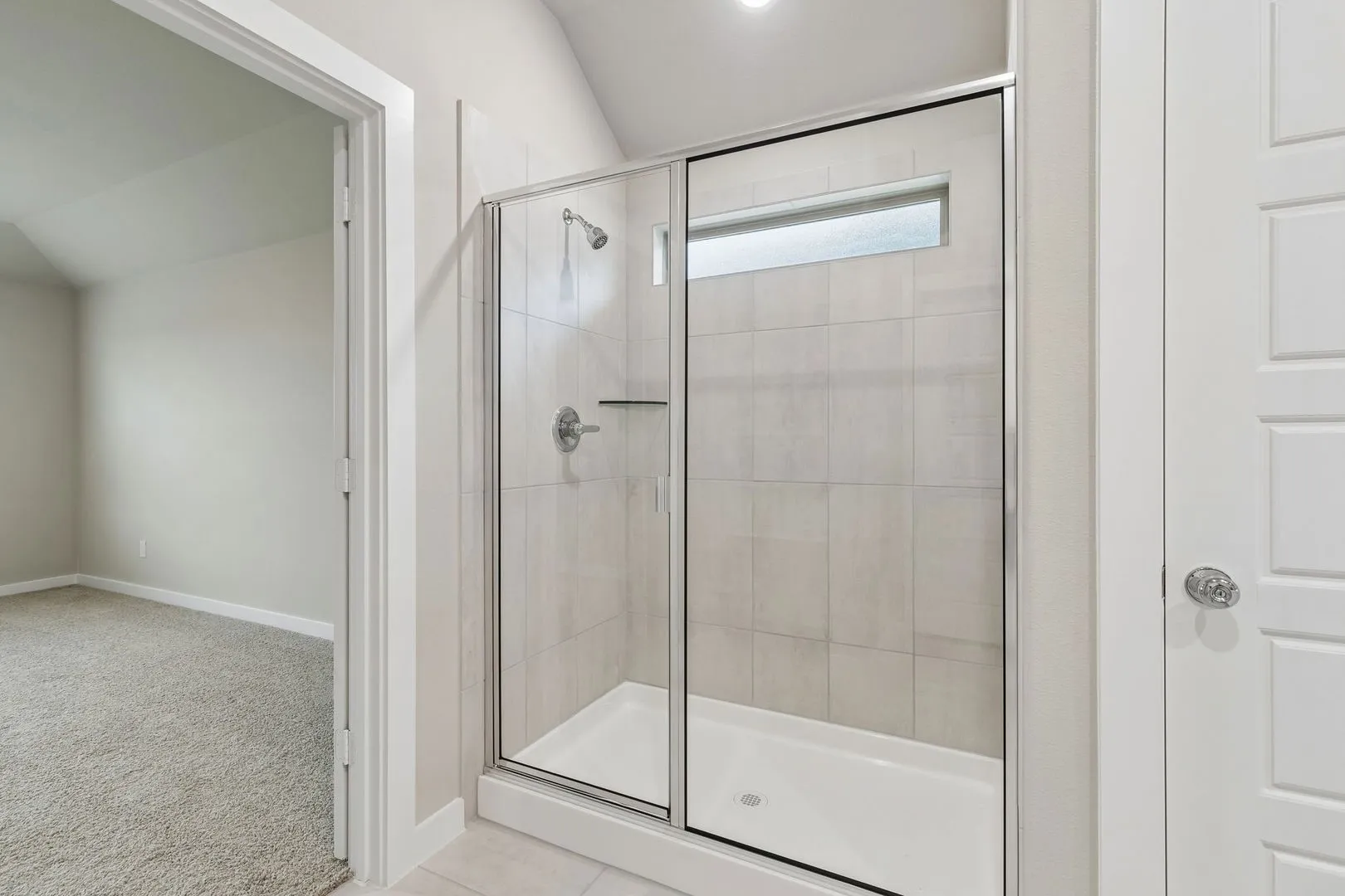 Primary Bathroom in the Emmy II home plan by Trophy Signature Homes - REPRESENTATIVE PHOTO
