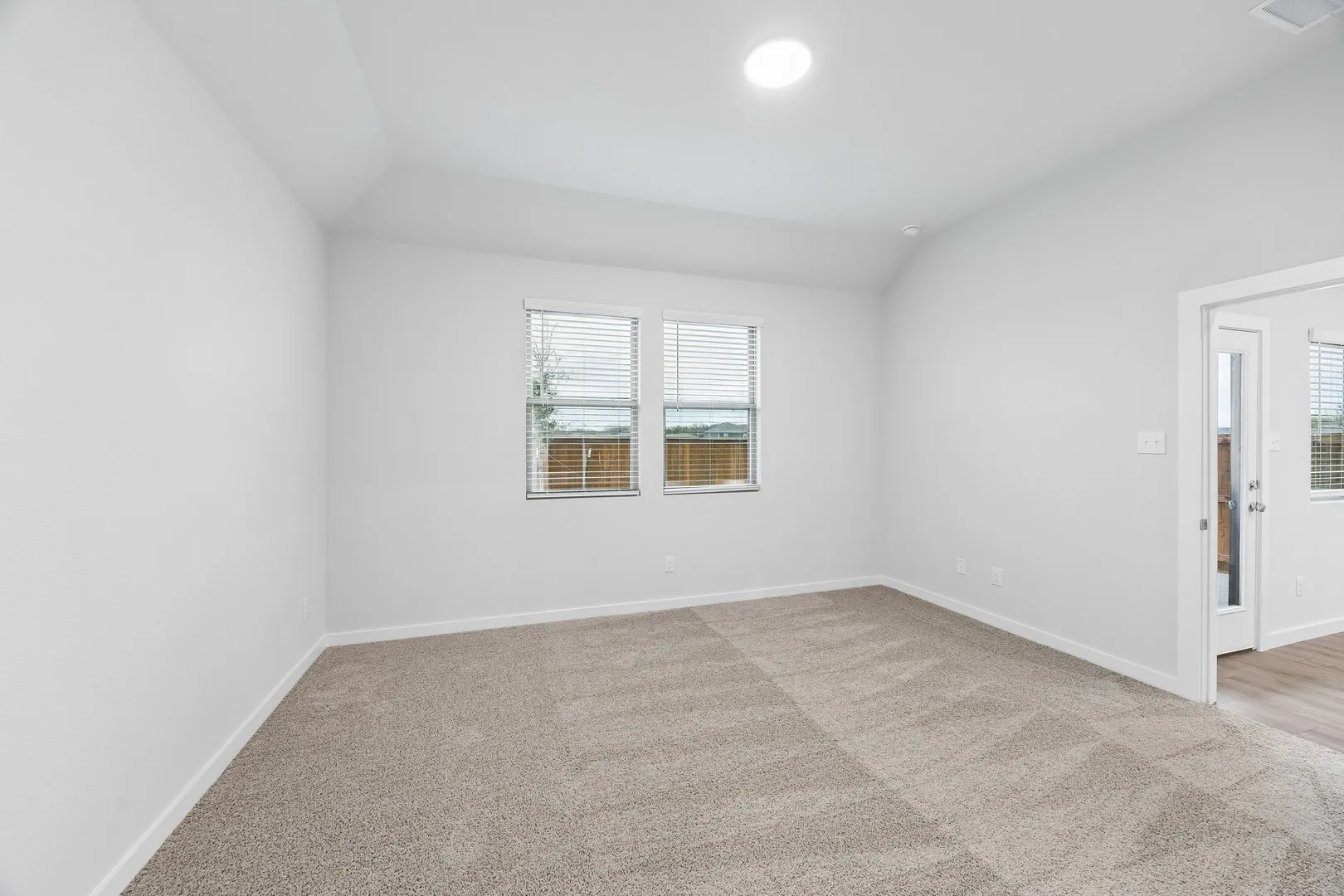 Primary Suite in the Cedar home plan by Trophy Signature Homes – REPRESENTATIVE PHOTO
