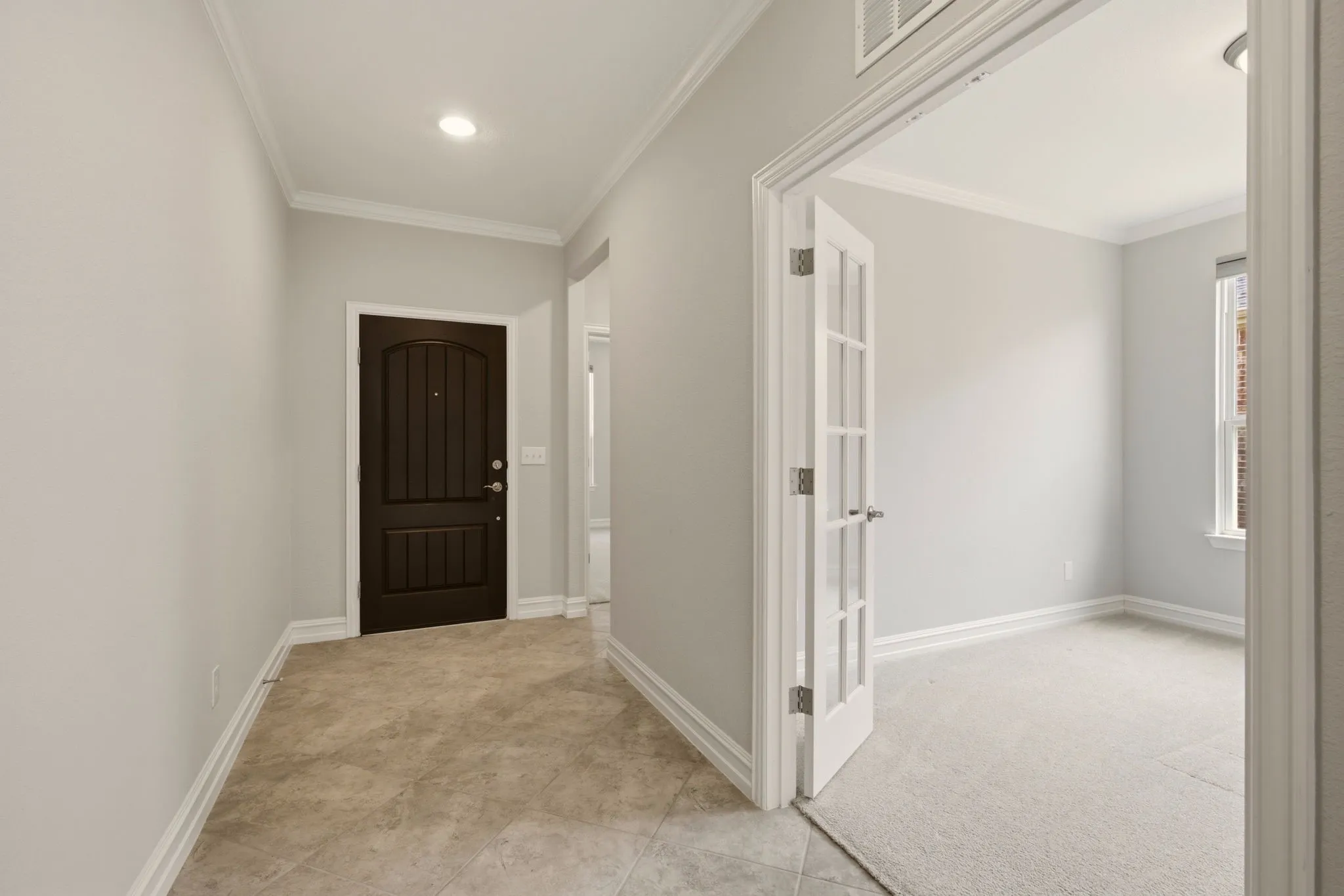 Foyer, showing French doors to the office / study