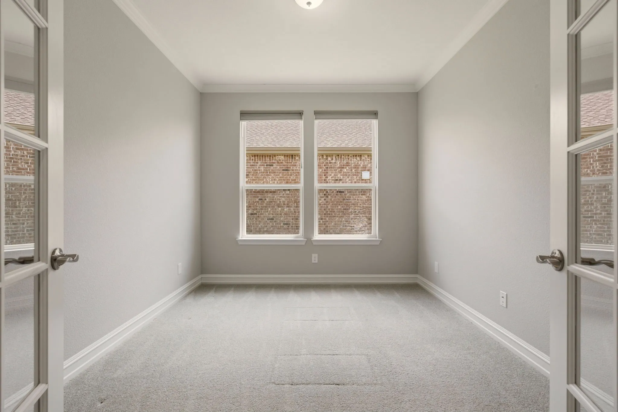 Office is opposite the Mud Room off garage.