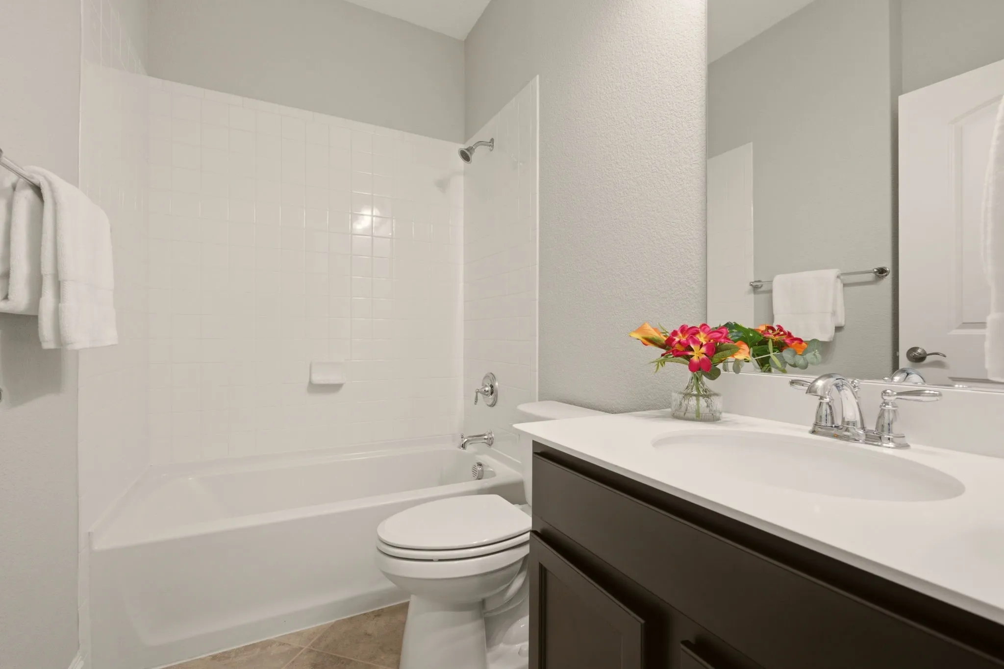 Second bath adjacent front bedroom and office.
