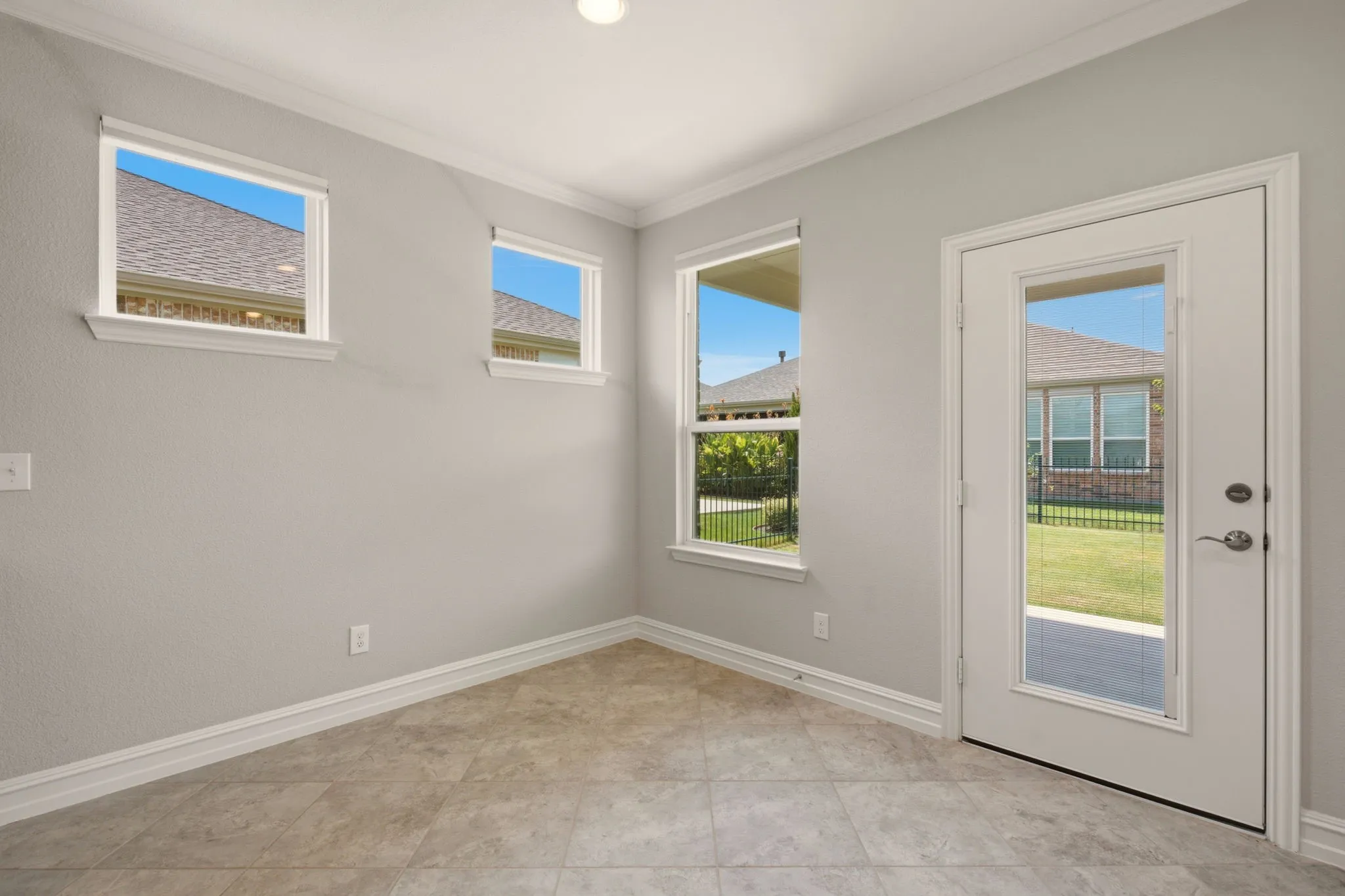 Dining area off covered patio.