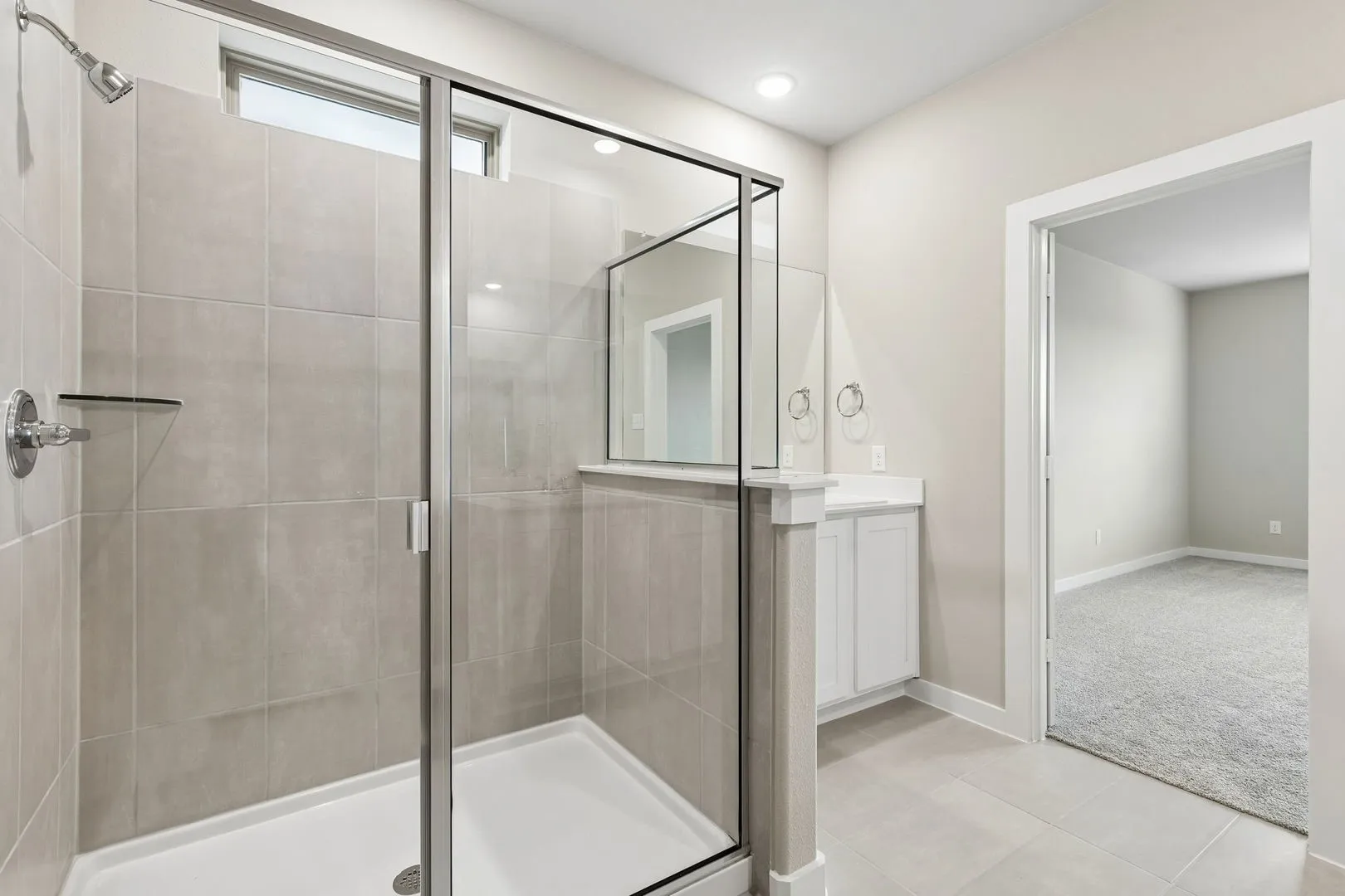 Primary Bathroom in the Winters home plan by Trophy Signature Homes – REPRESENTATIVE PHOTO