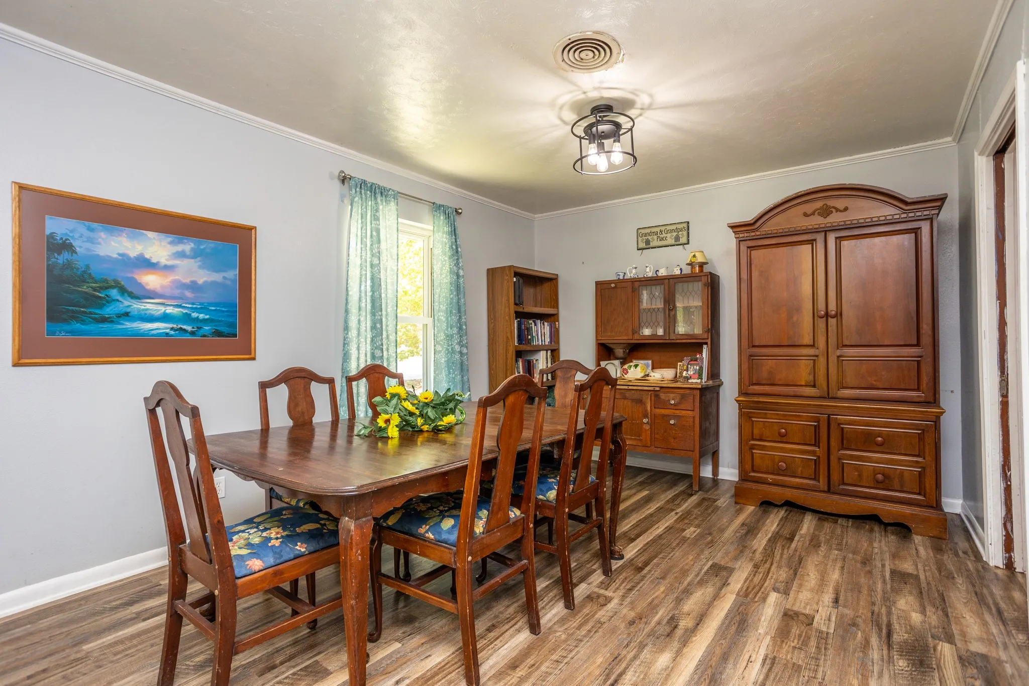 Formal dining area with door to kitchen on right.