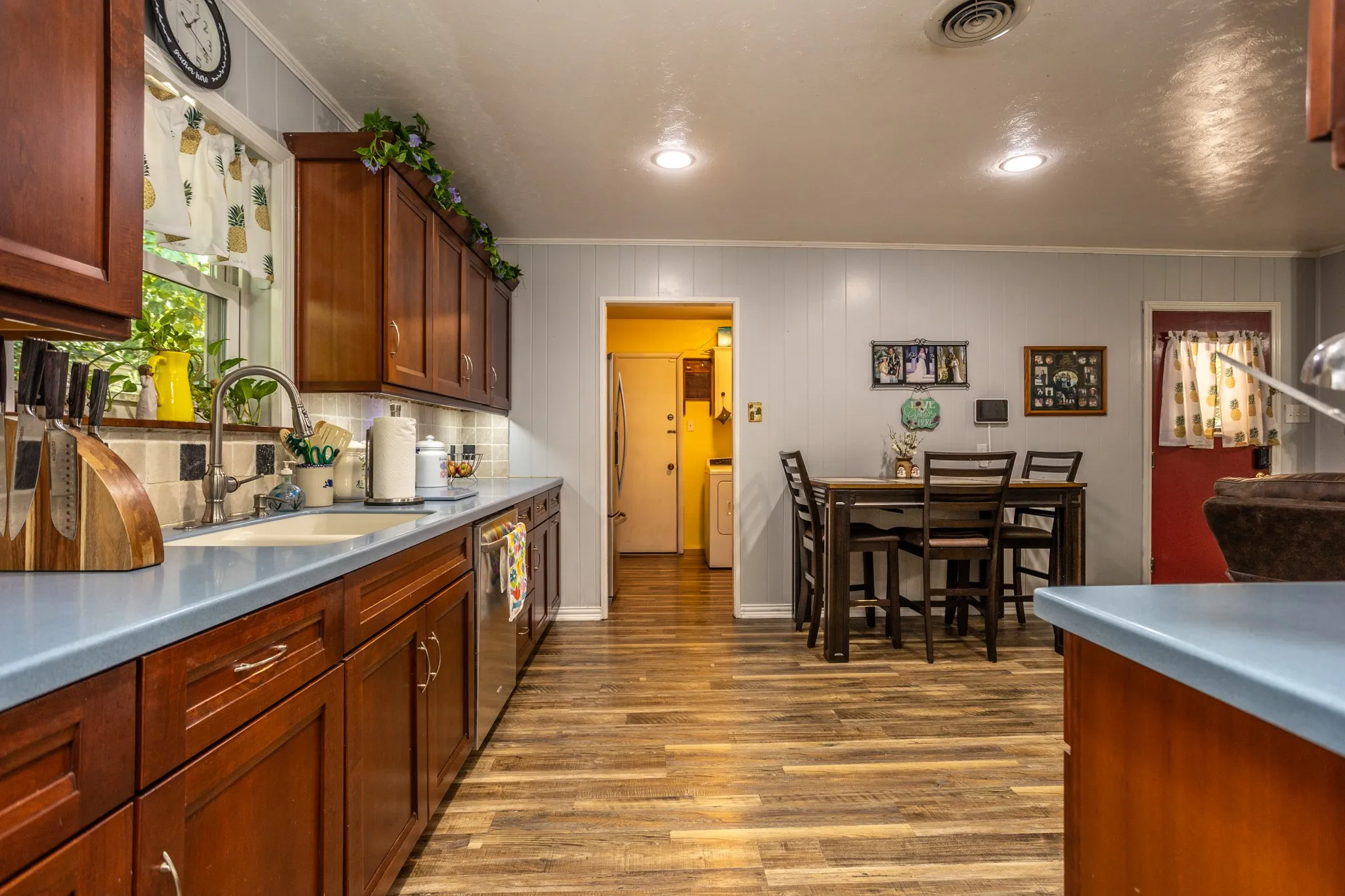 Space for dining area in kitchen.  Refrigerator freezer in Utility room but right next to kitchen for easy access.