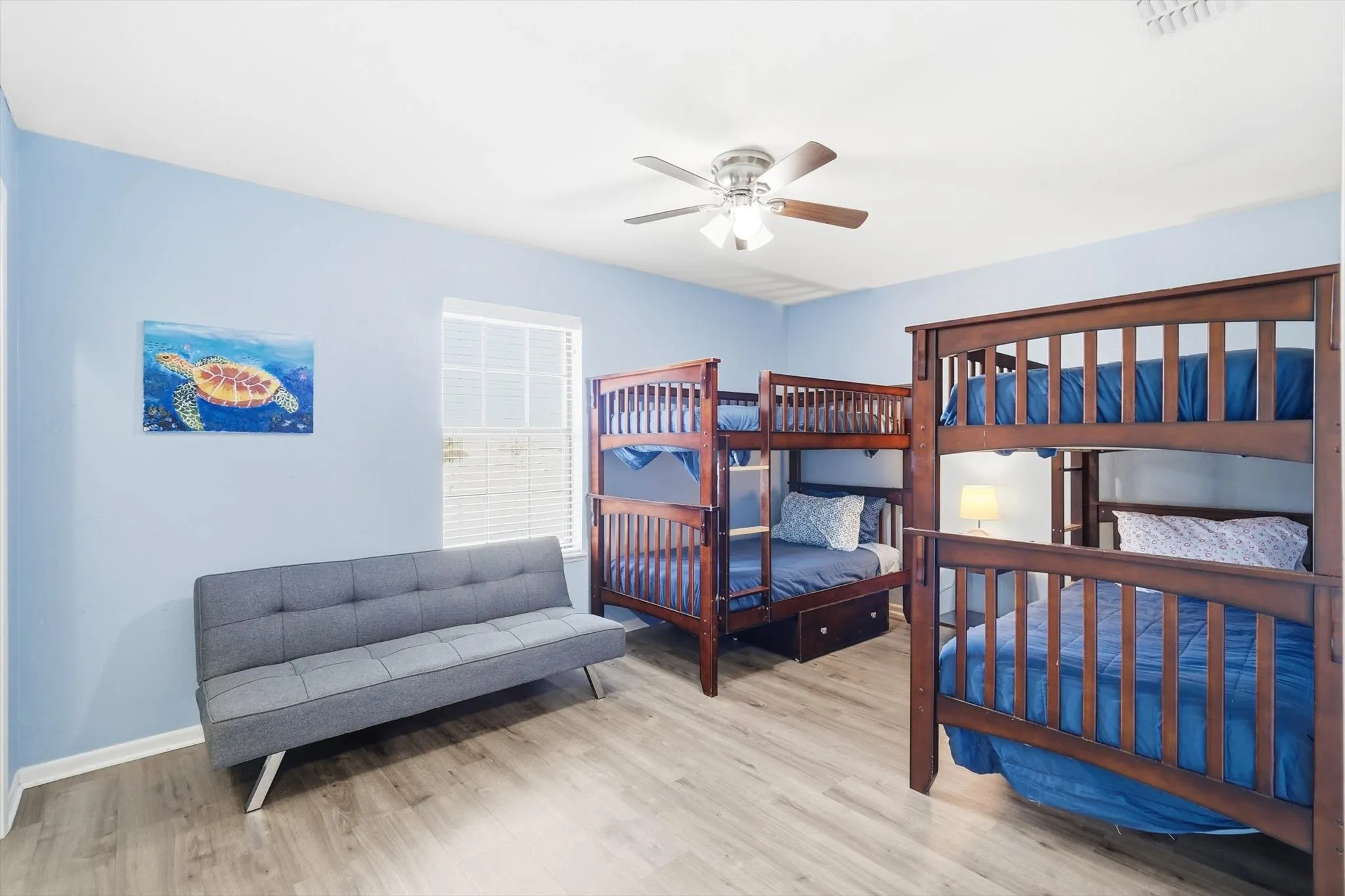 Bedroom with bunks, fold down sofa.