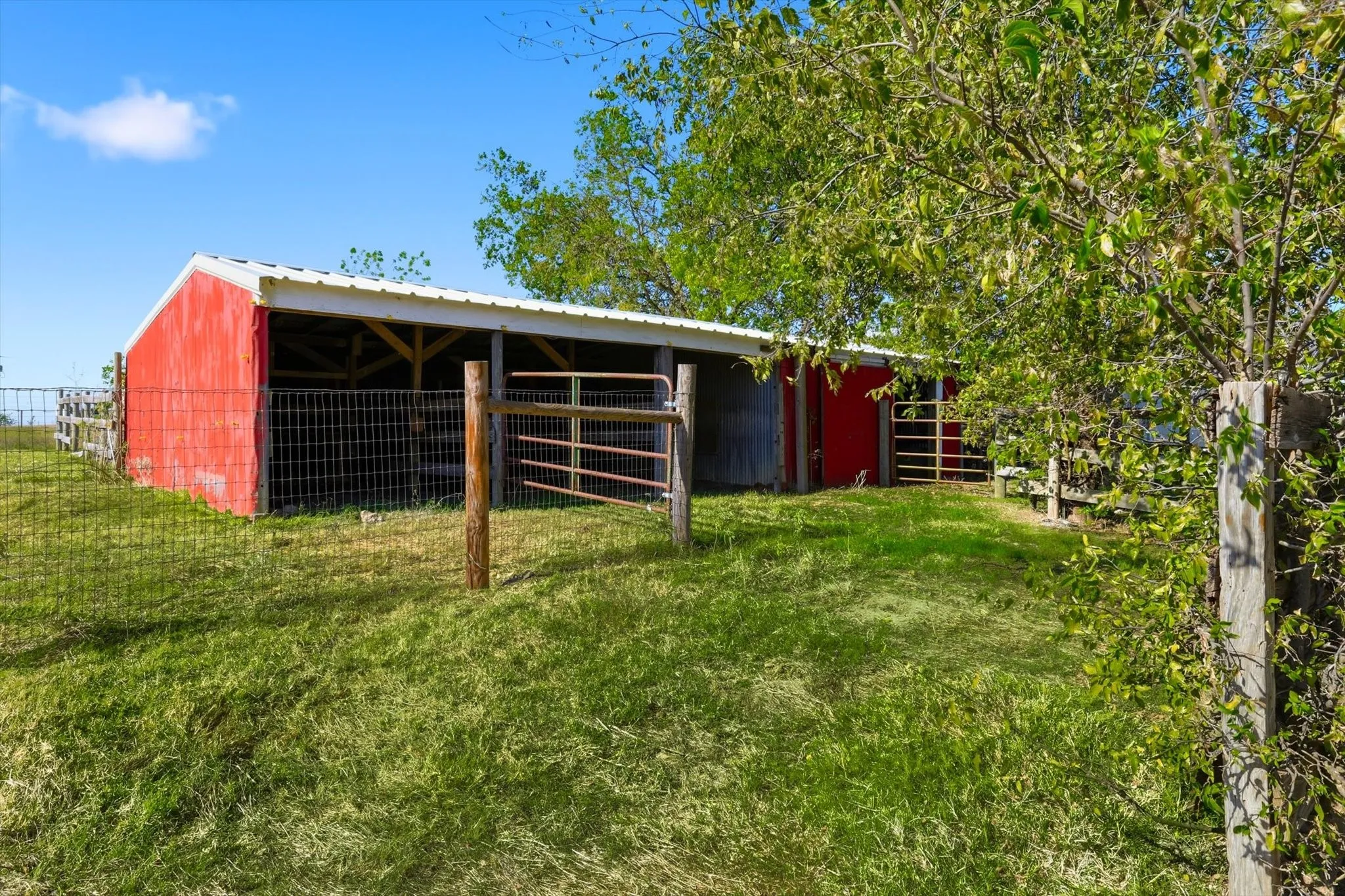 View of outbuilding with an exterior structure