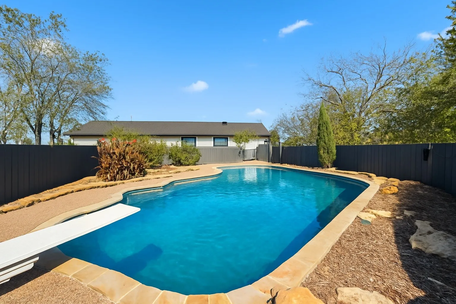 Exterior swimming pool with fence surround and private!