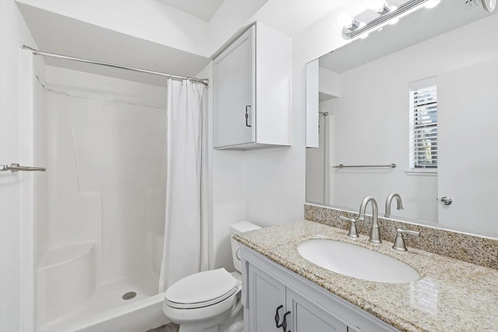 Bathroom for primary suite.
