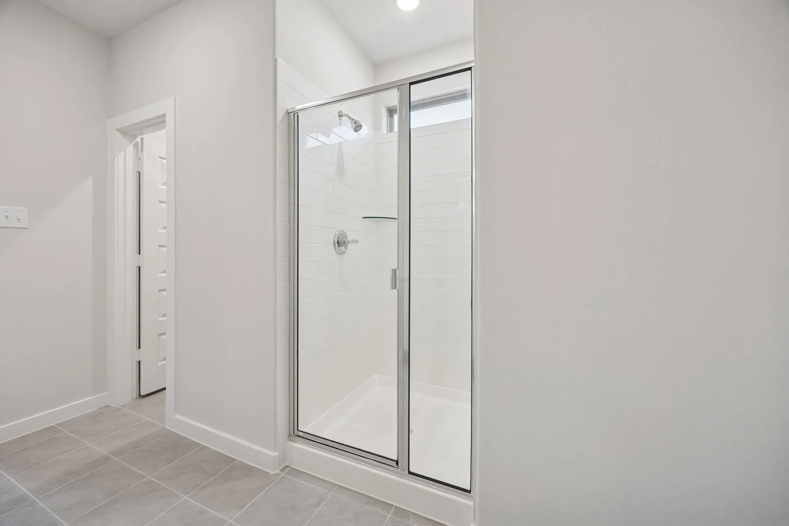 Primary Bathroom in the Oak II home plan by Trophy Signature Homes – REPRESENTATIVE PHOTO