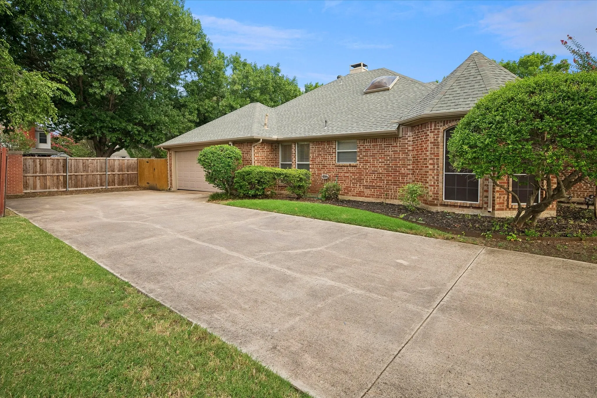 Side entry garage. Home in view at back of photo is across the street.