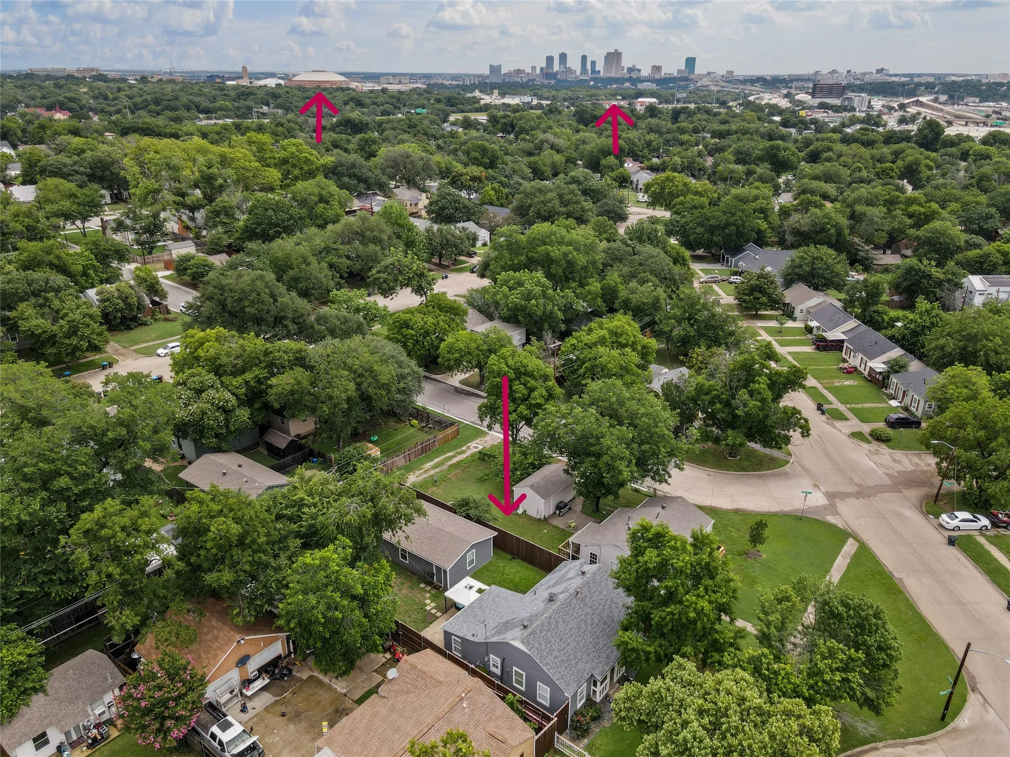 Looking east with views of downtown Fort Worth and Dickie's Arena