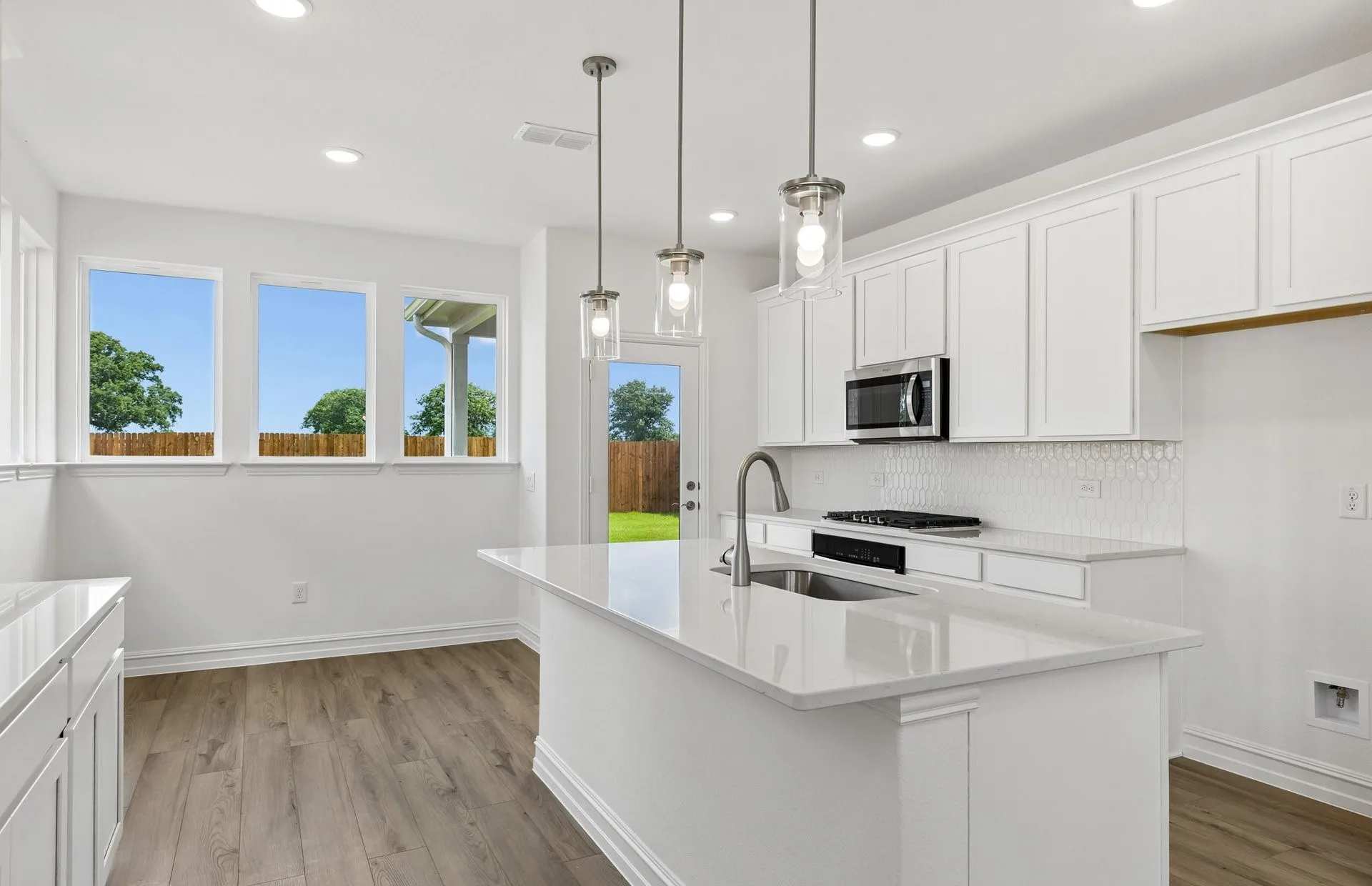 *Floorplan representation, not actual home - Dining area off kitchen with large windows
