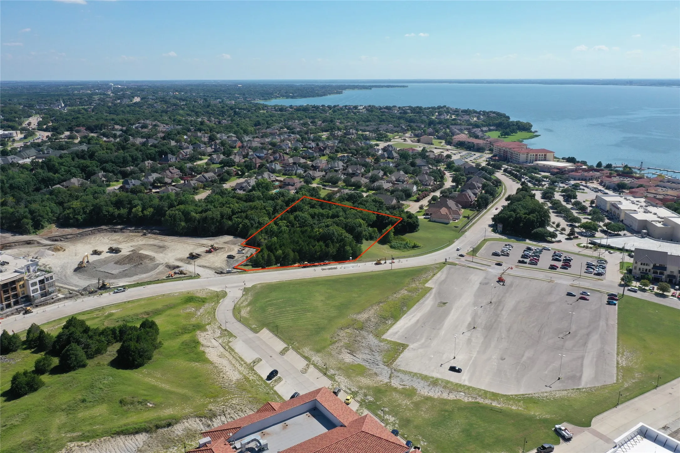 Expansive land parcel outlined in red, featuring significant tree coverage