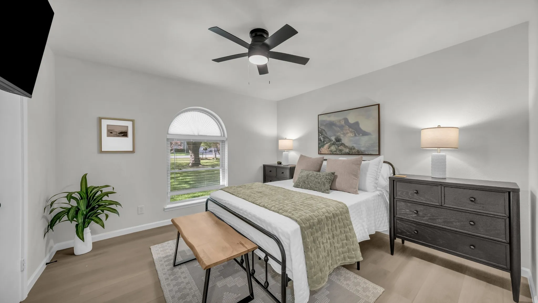 Smart TV's in each bedroom. Two smaller dressers double as night stands with lamps