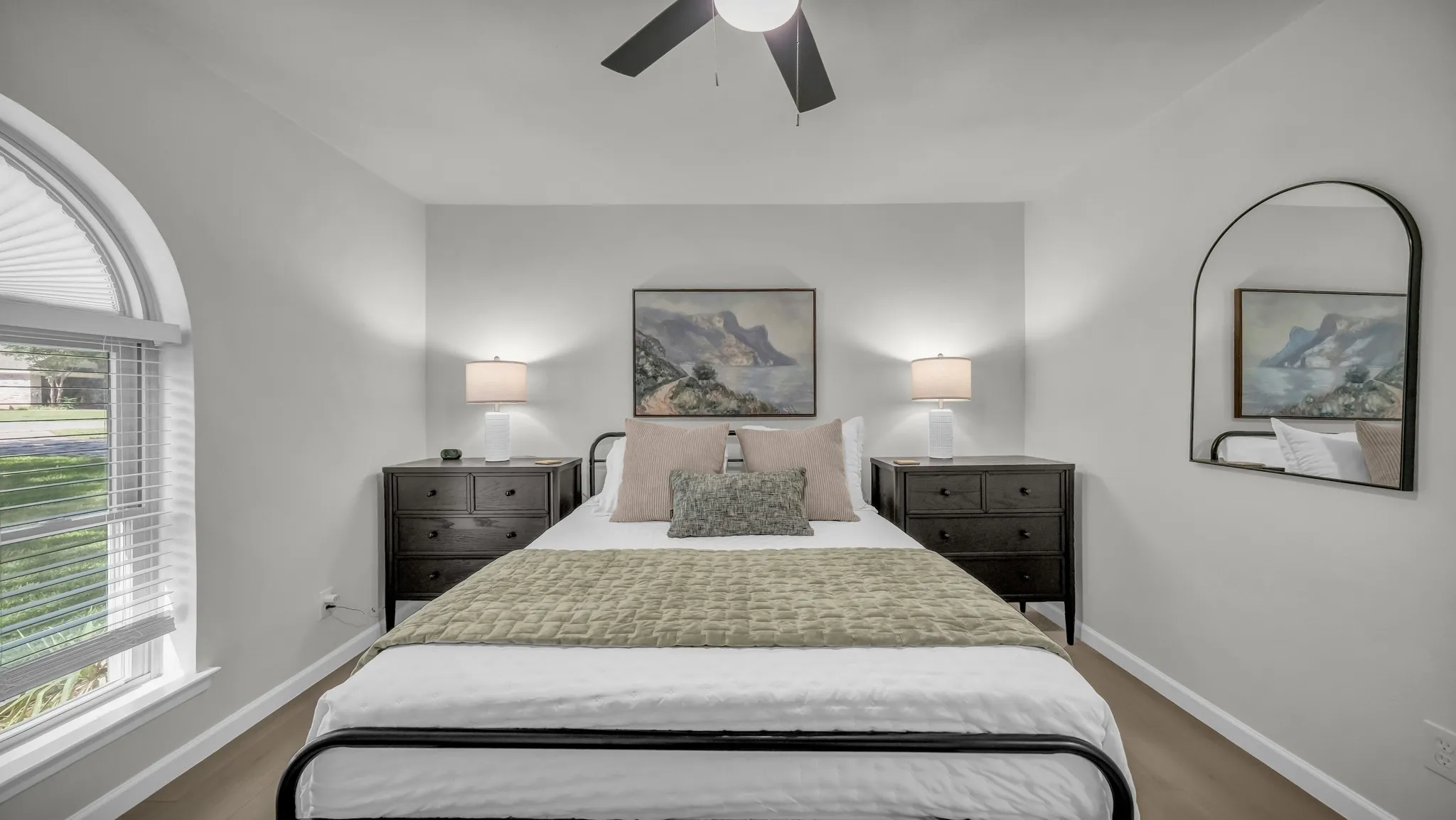 Comfy queen bed with extra sheets, blankets and pillows