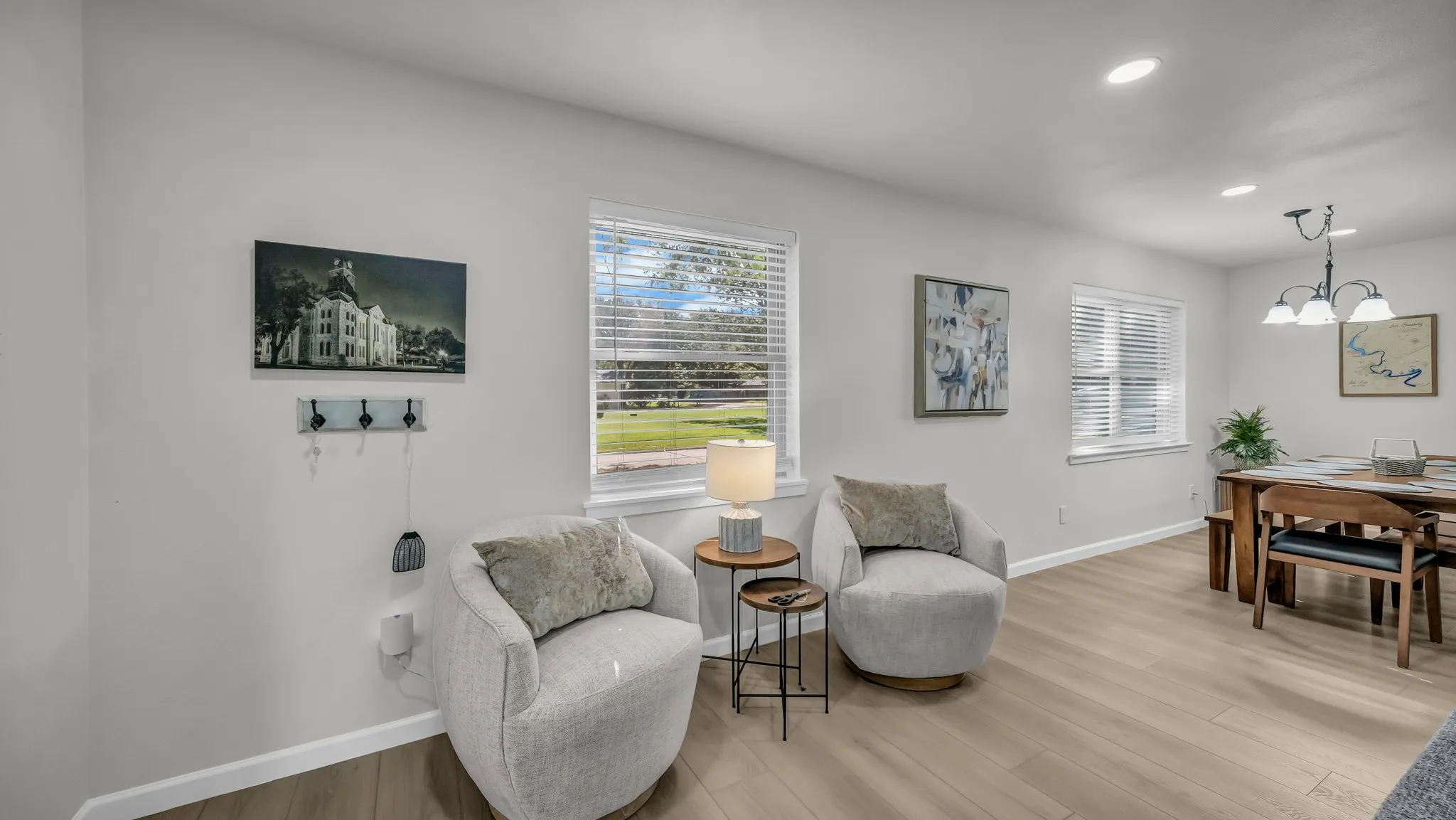 Comfy chairs with a view of everything happening in the living room, kitchen, dining and even out the sliding doors to watch the geese play!