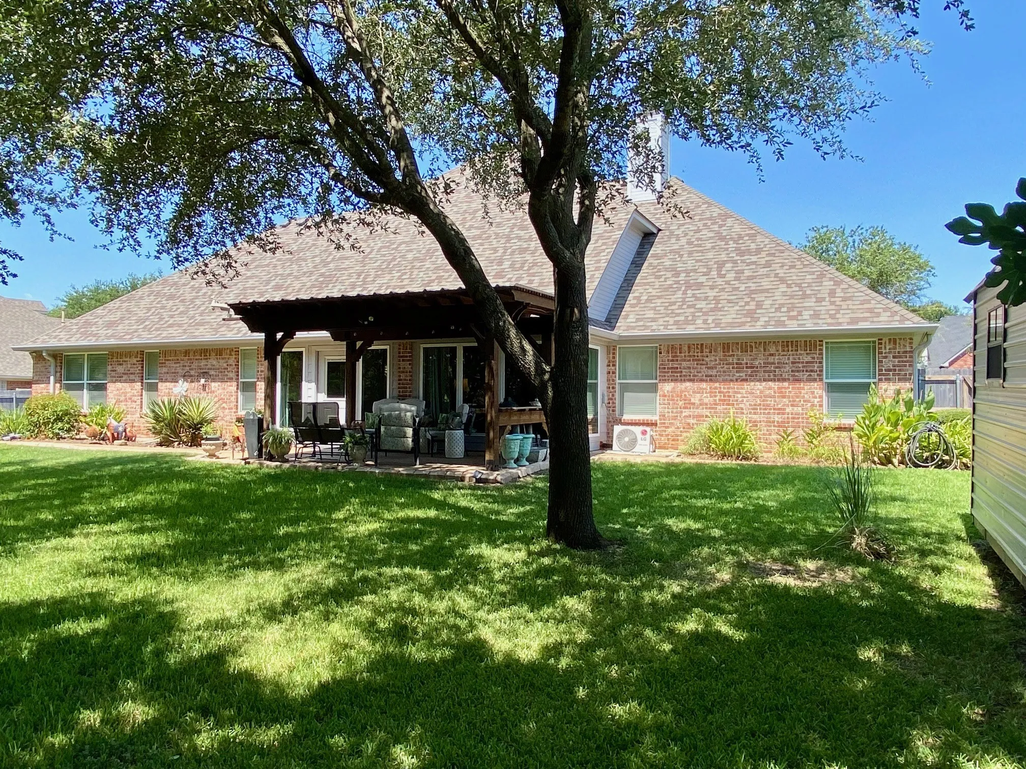Rear Elevation showing Back Patio and Pergola
