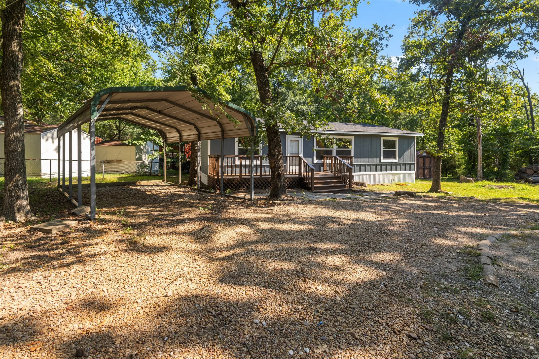Front of home with carport