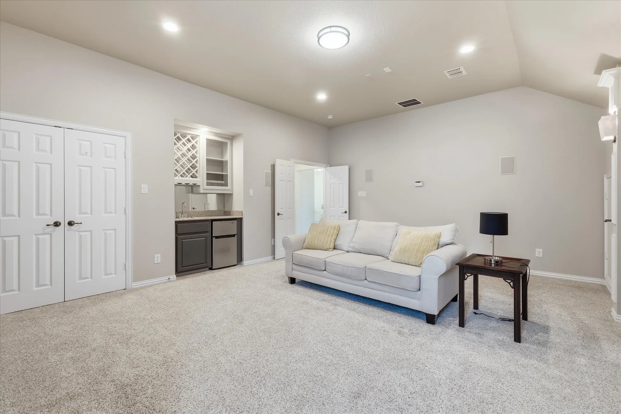 This Media Room has an oversized closet, window, sink area and small frig. Can easily be used for guest room or 5th bedroom.