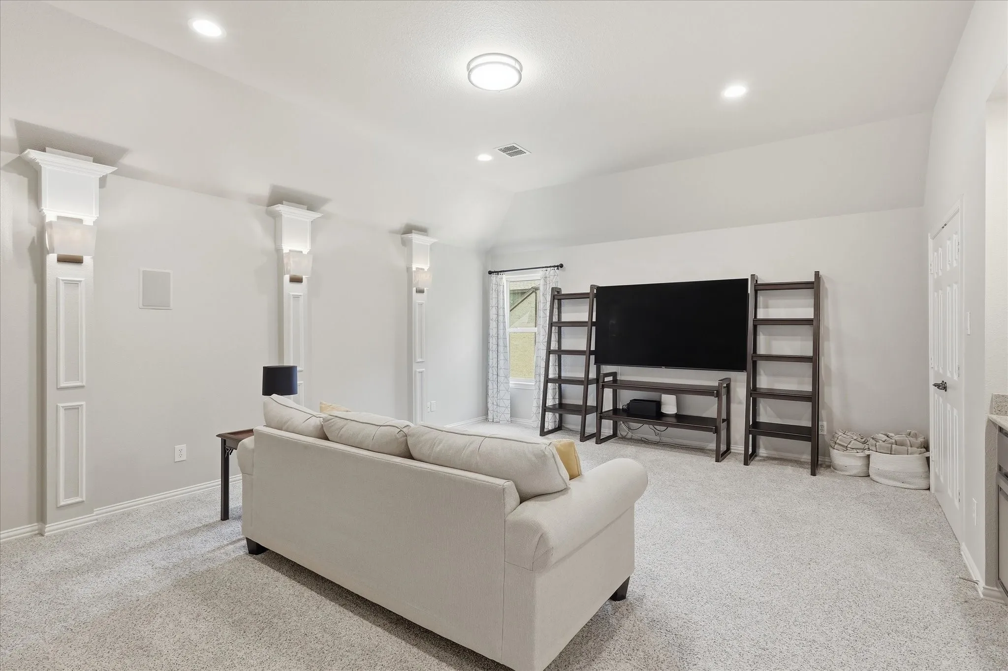 This Media Room has an oversized closet, window, sink area and small frig. Can easily be used for guest room or 5th bedroom.