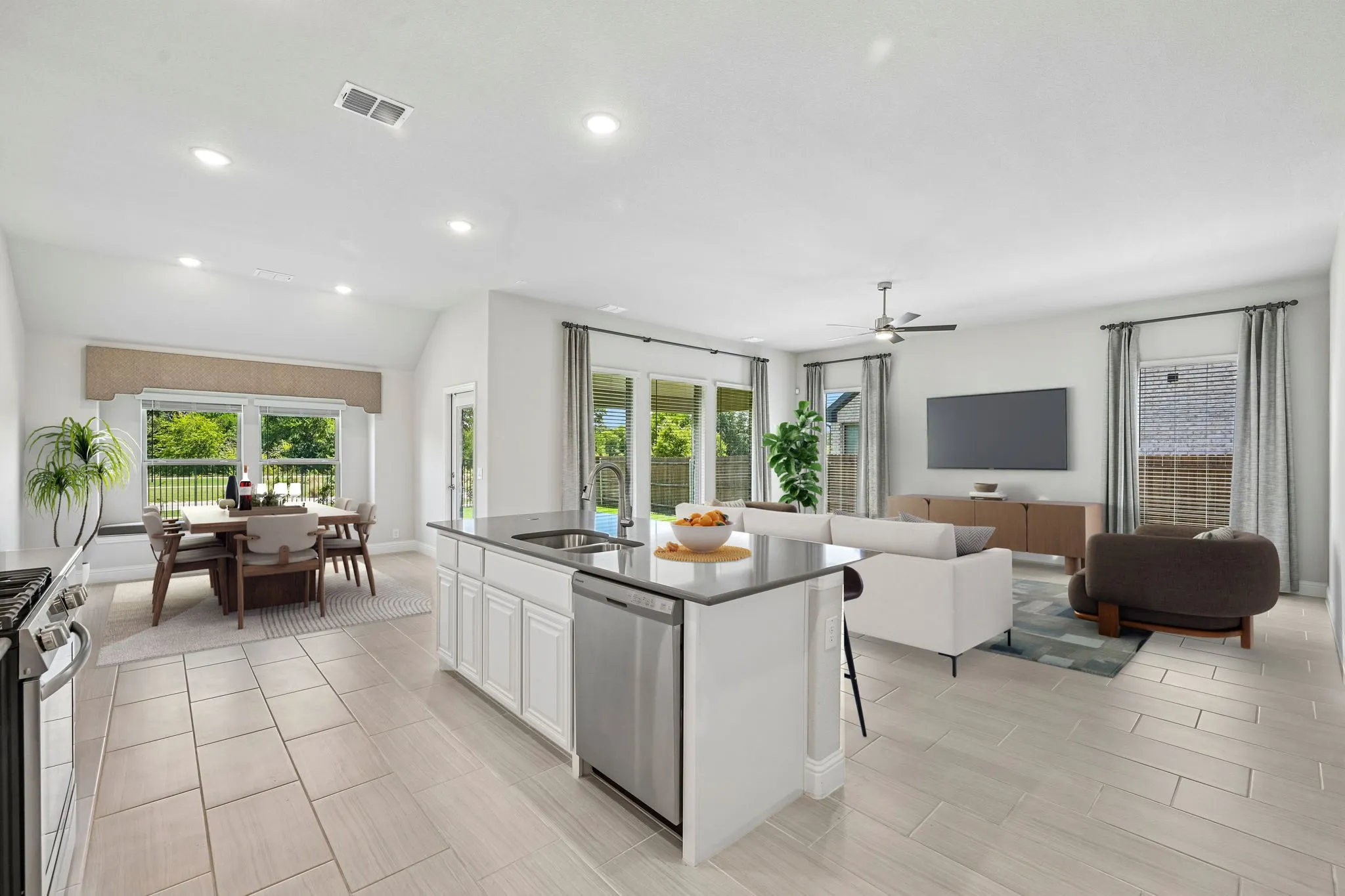 Open concept living room and kitchen - digitally staged