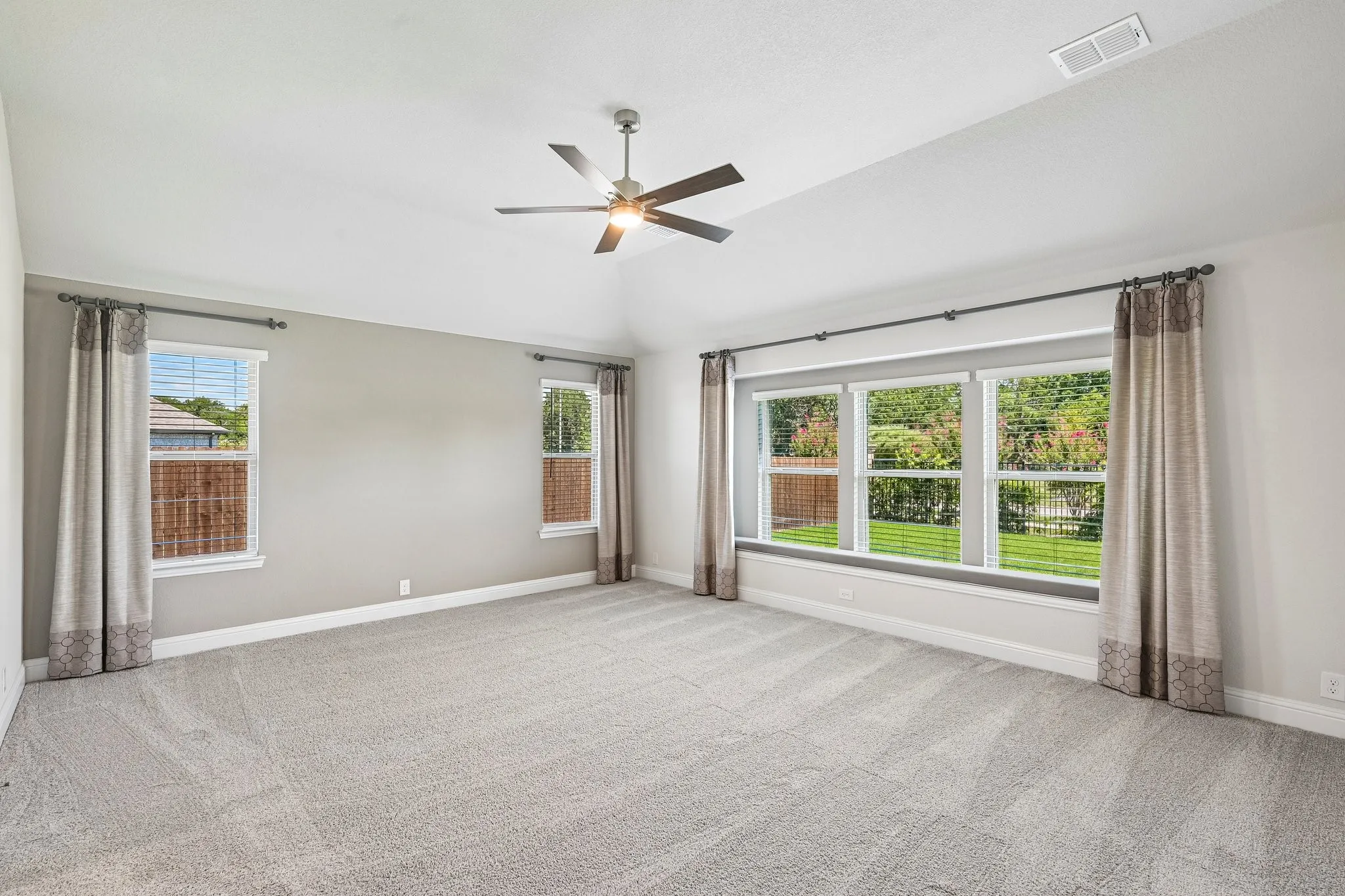 Primary suite in back of home