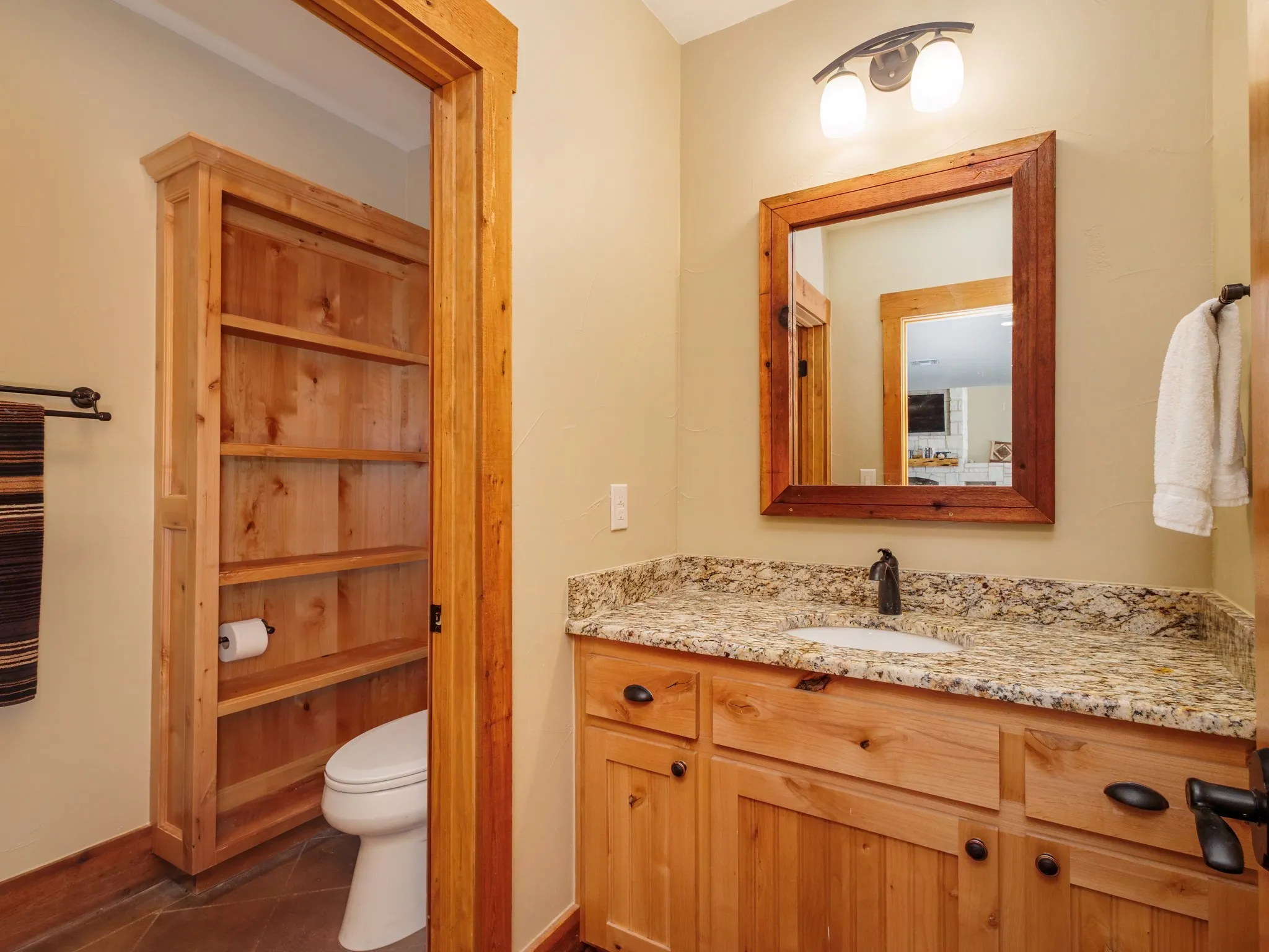 Downstairs full bath with shower.  Granite counter tops