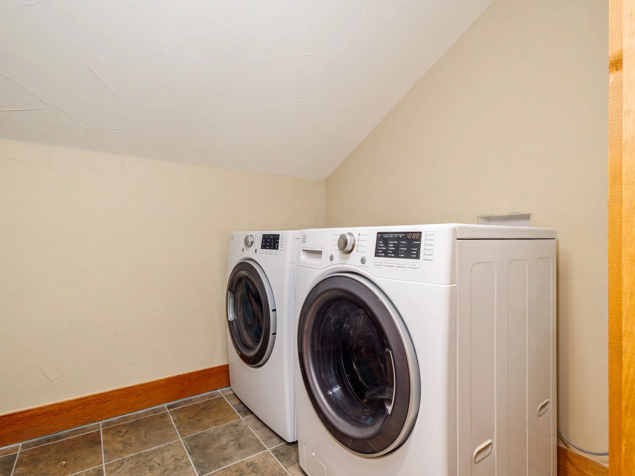 Laundry room is upstairs convenient to the bedrooms