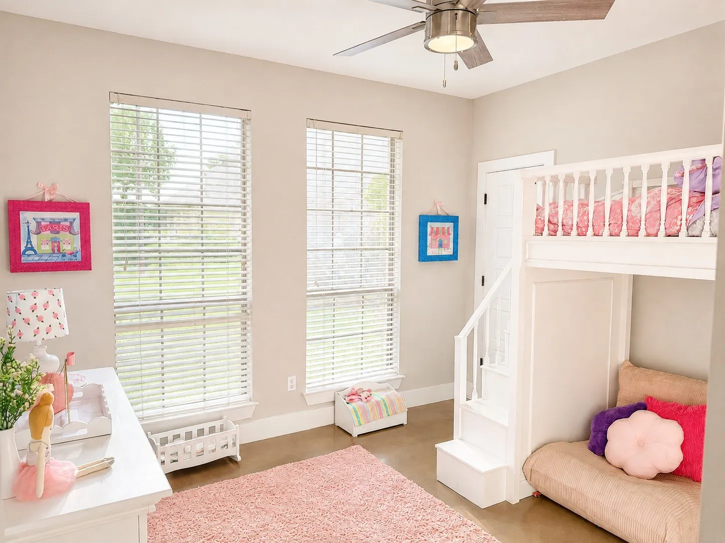 Bedroom 4 featuring two large windows with horizontal blinds, a ceiling fan with wood-finish blades, and concrete flooring