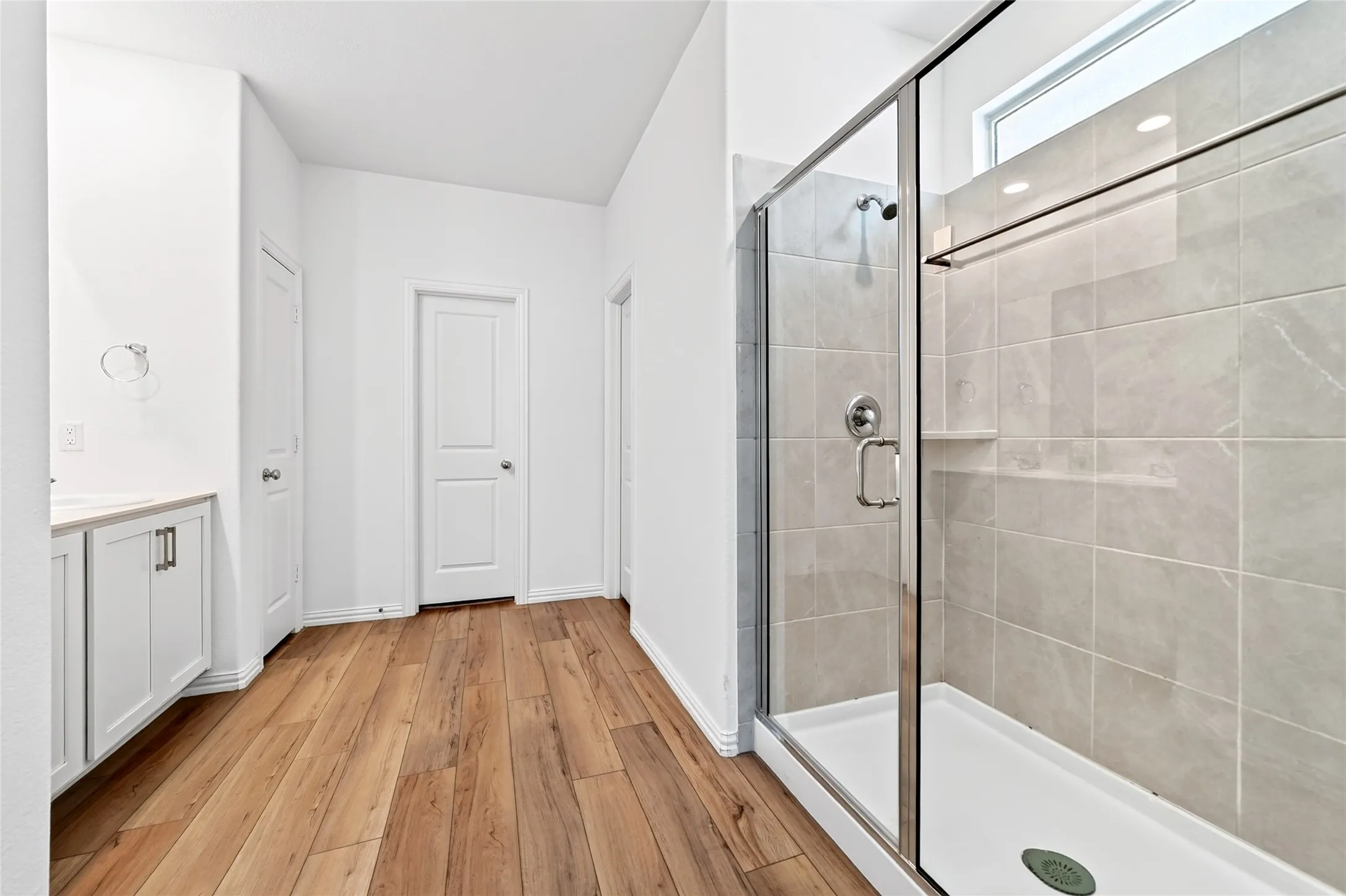 Primary bathroom with a walk-in shower