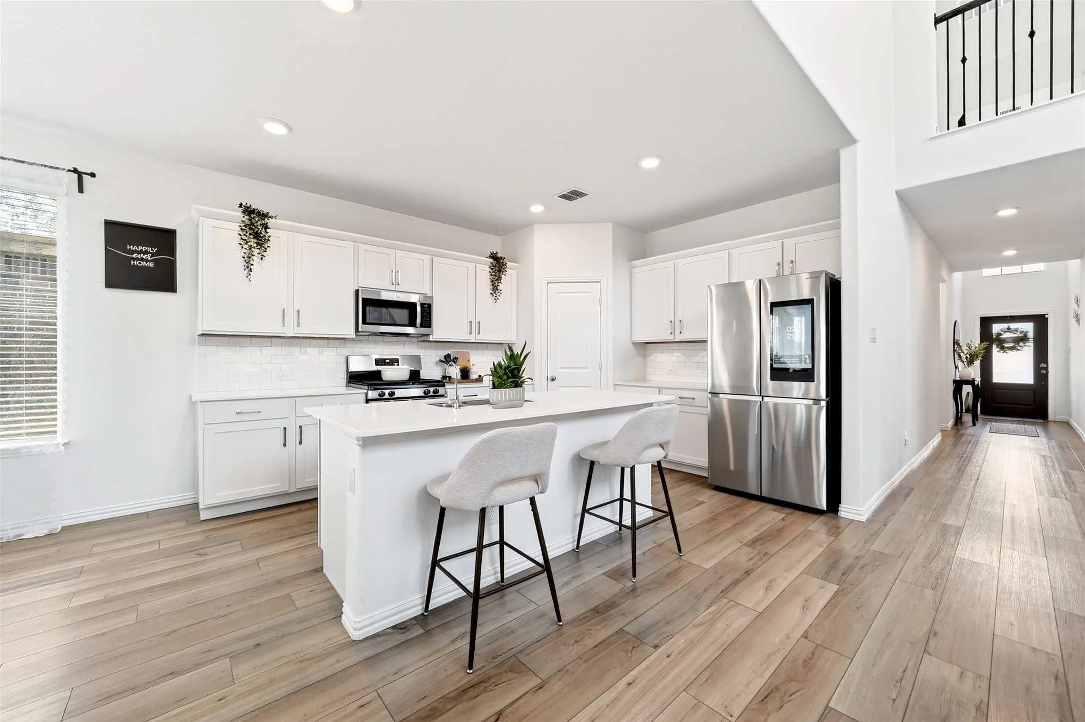 Look at those gorgeous luxury vinyl floors. They are 100% waterproof and scratch resistant