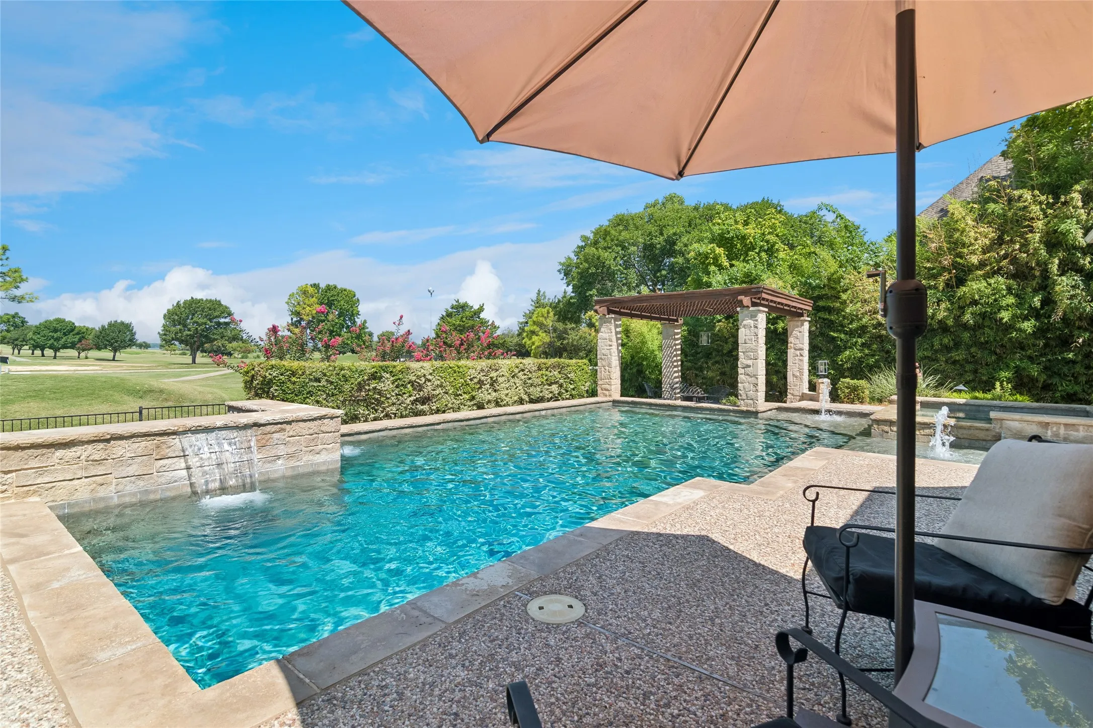 View of pool looking out to fairway