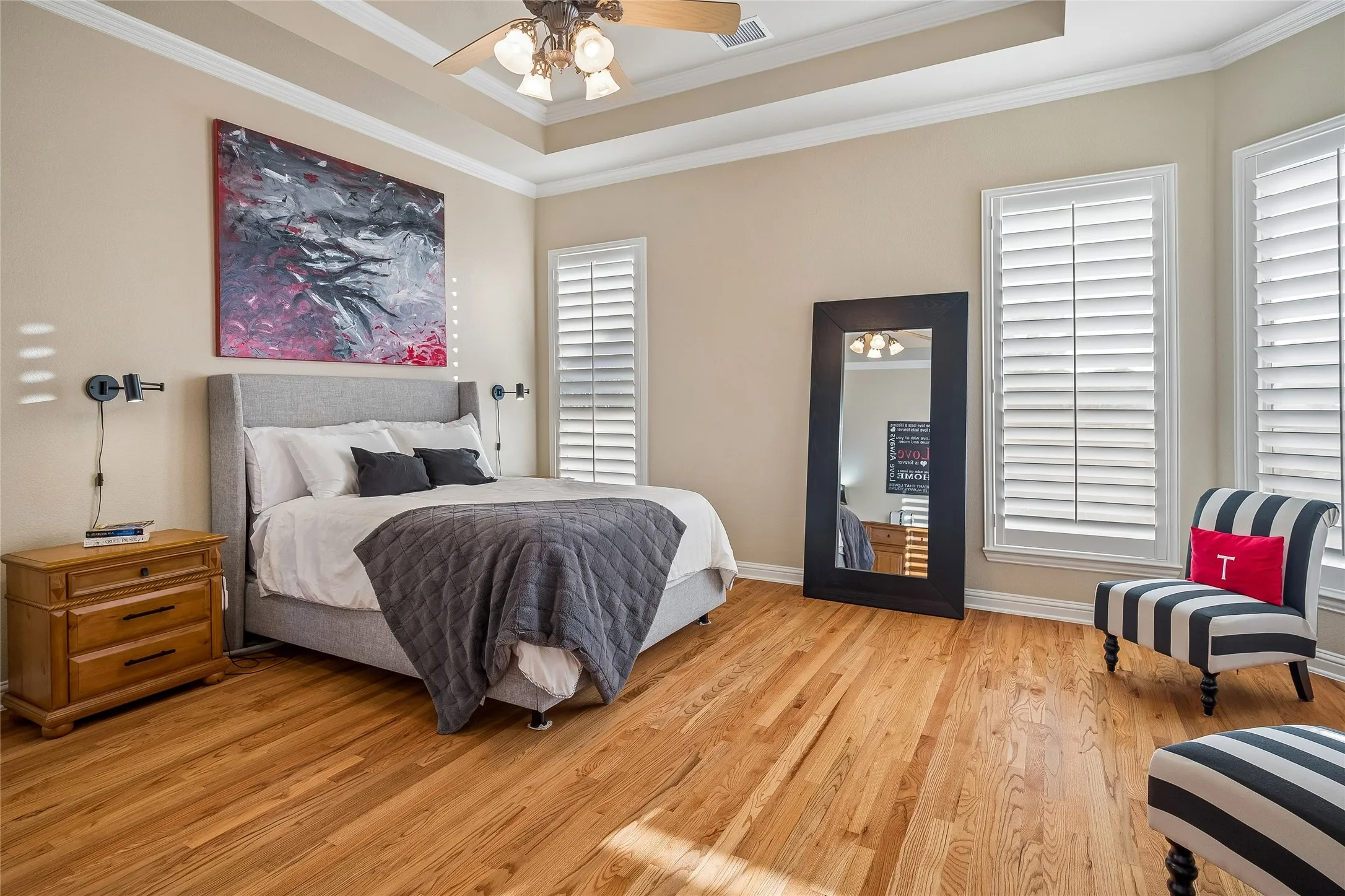 Plantation shutters,wall of windows view pool