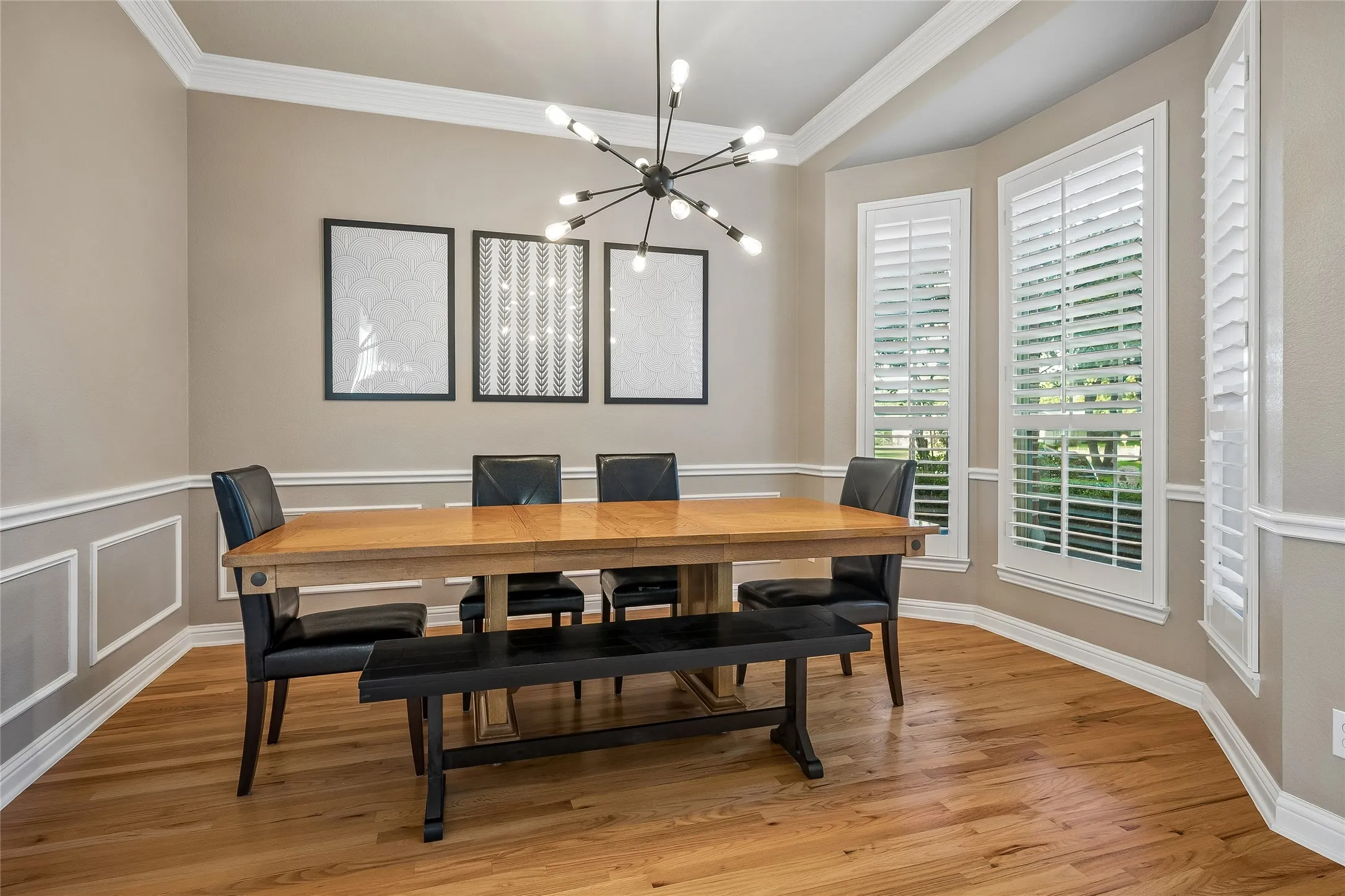 Formal dining,plantation shutters,crown/chair molding