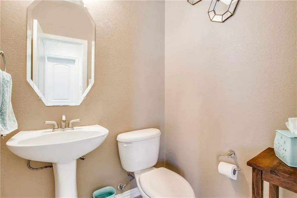 Half bathroom featuring toilet