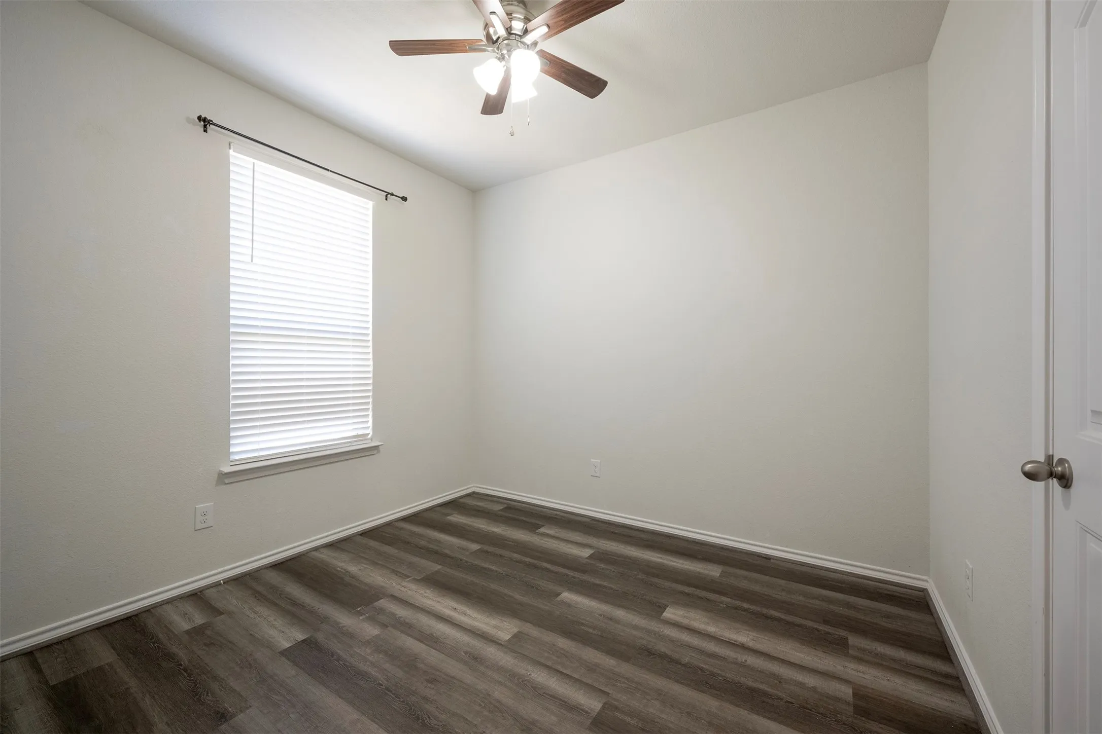 4th Bedroom offers Vinyl Plank Flooring - rather than Carpet - could be an office or exercise room.